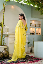 Amber Aura (Handpainted Viscose Silk Organza Saree in Yellow)