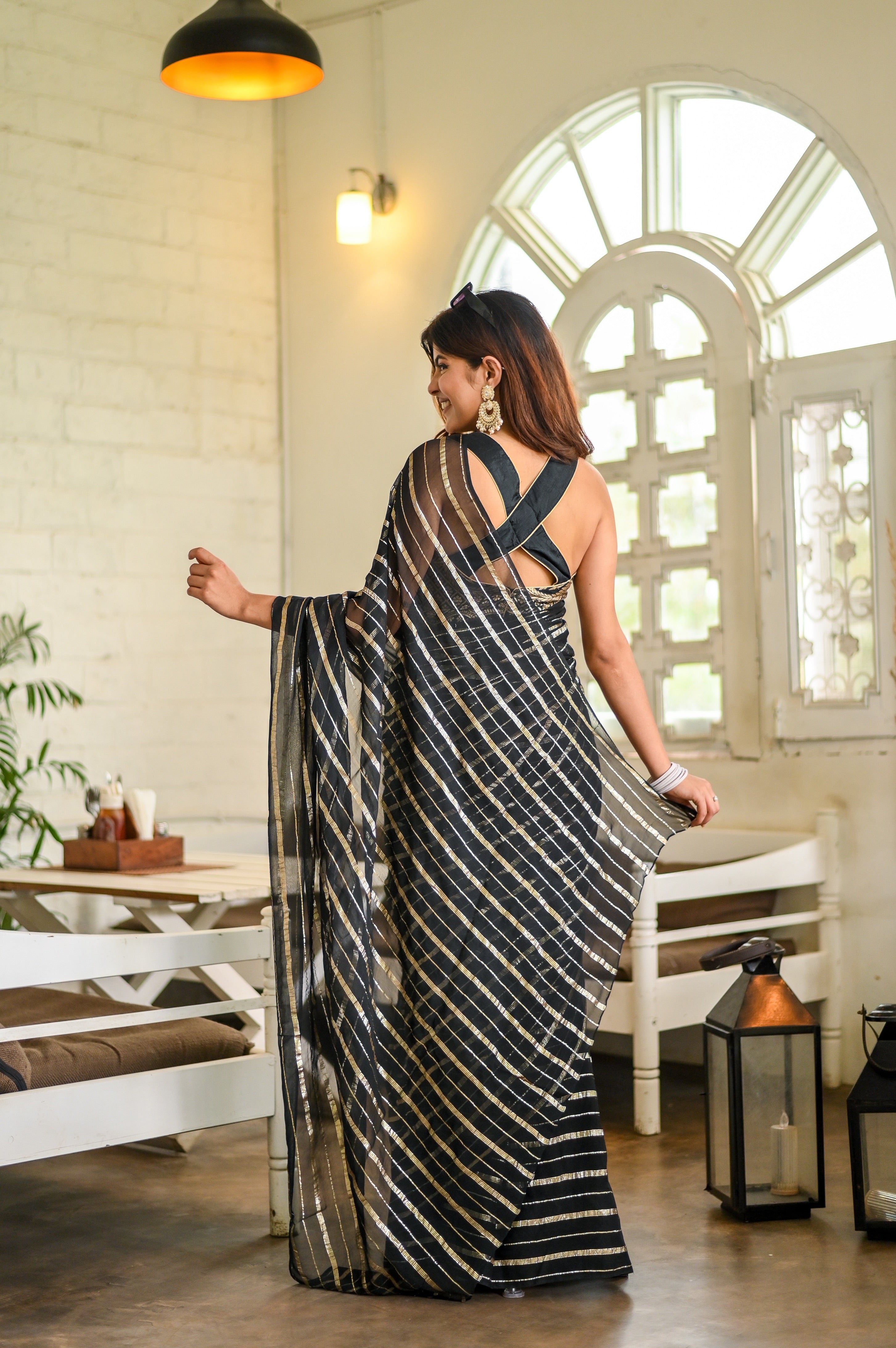 Midnight Magic (Pure Georgette Zari Striped Saree)