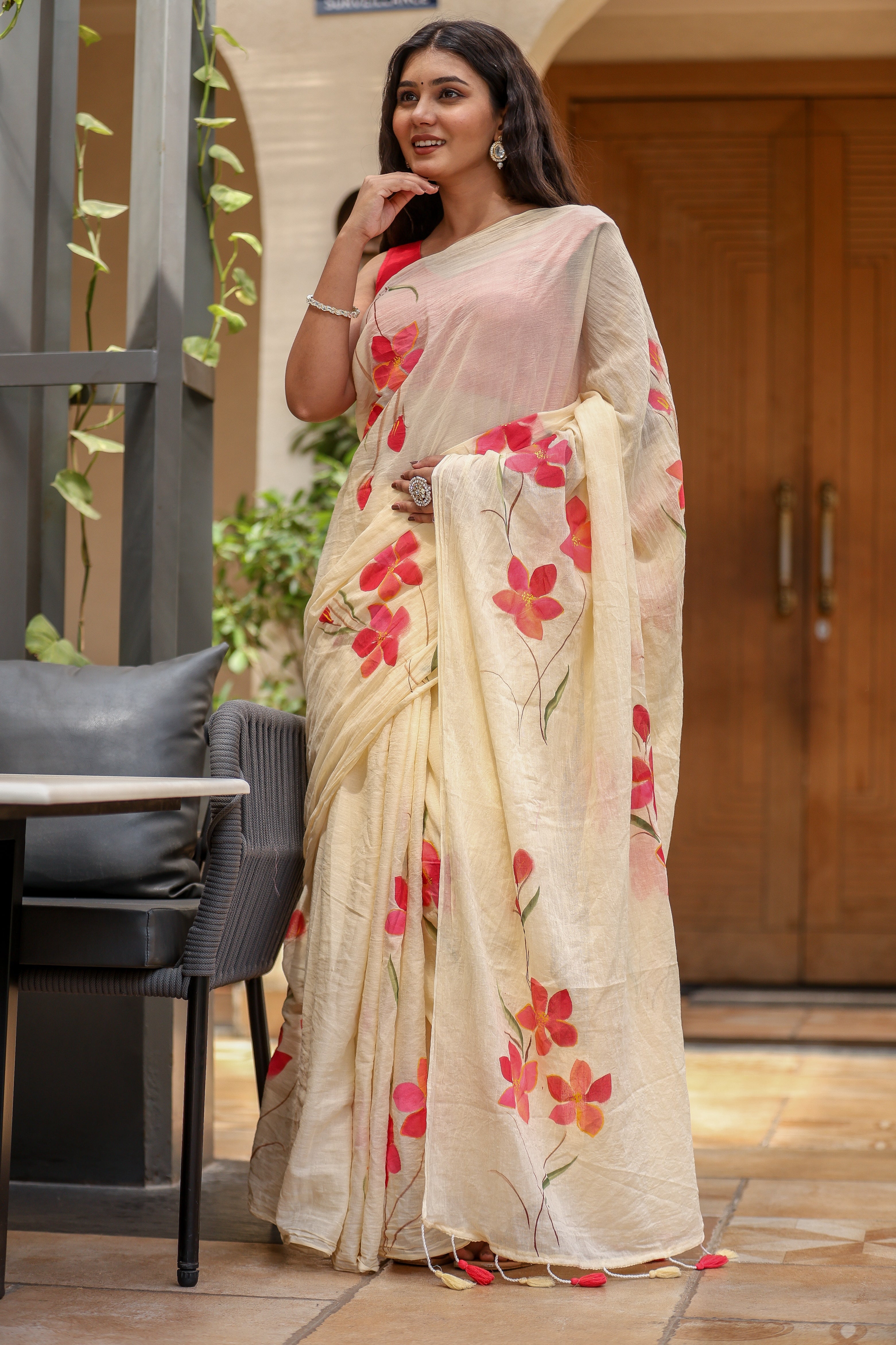 Petal Whisper (Handpainted Ivory Creme Malmal Saree)