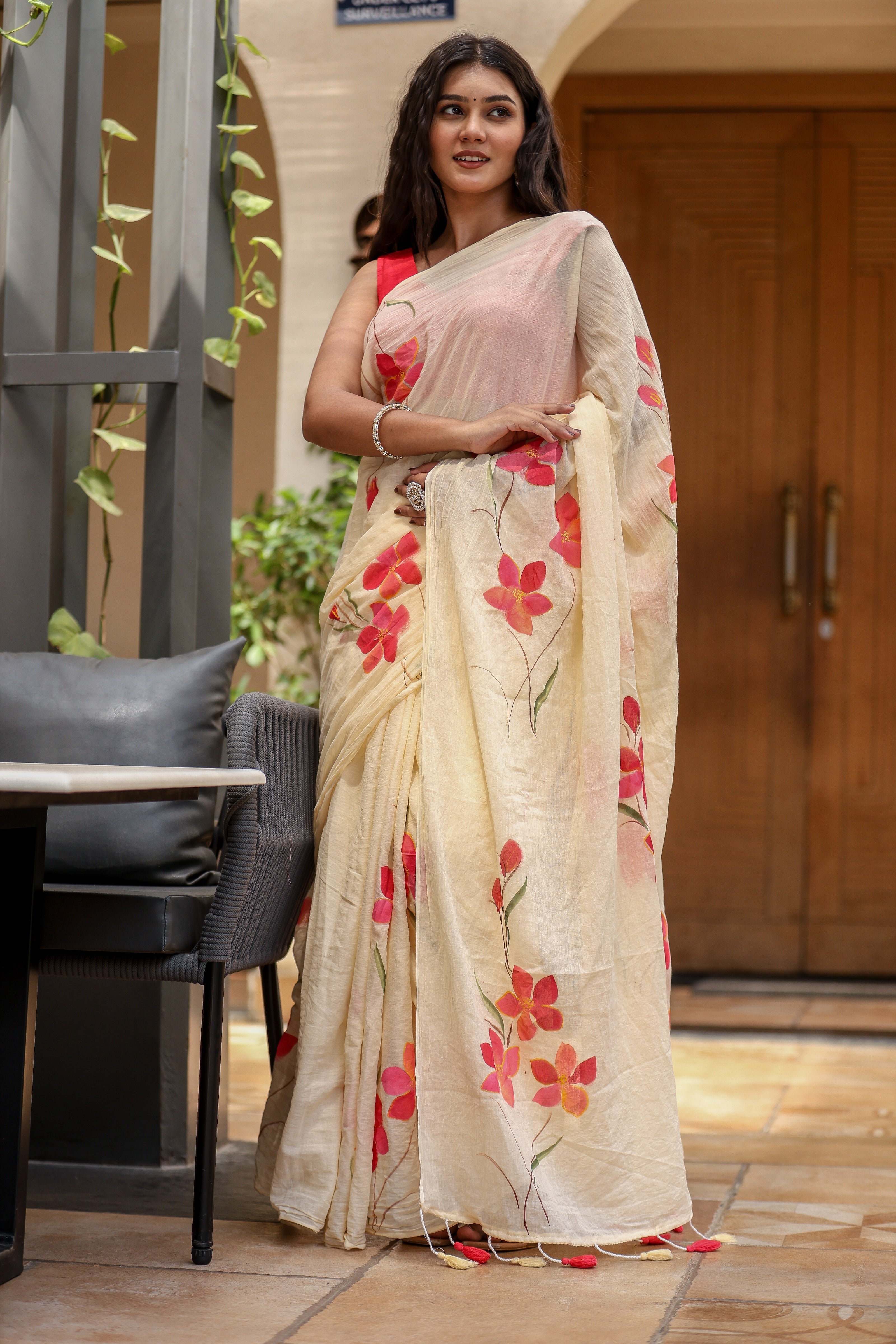 Petal Whisper (Handpainted Ivory Creme Malmal Saree)