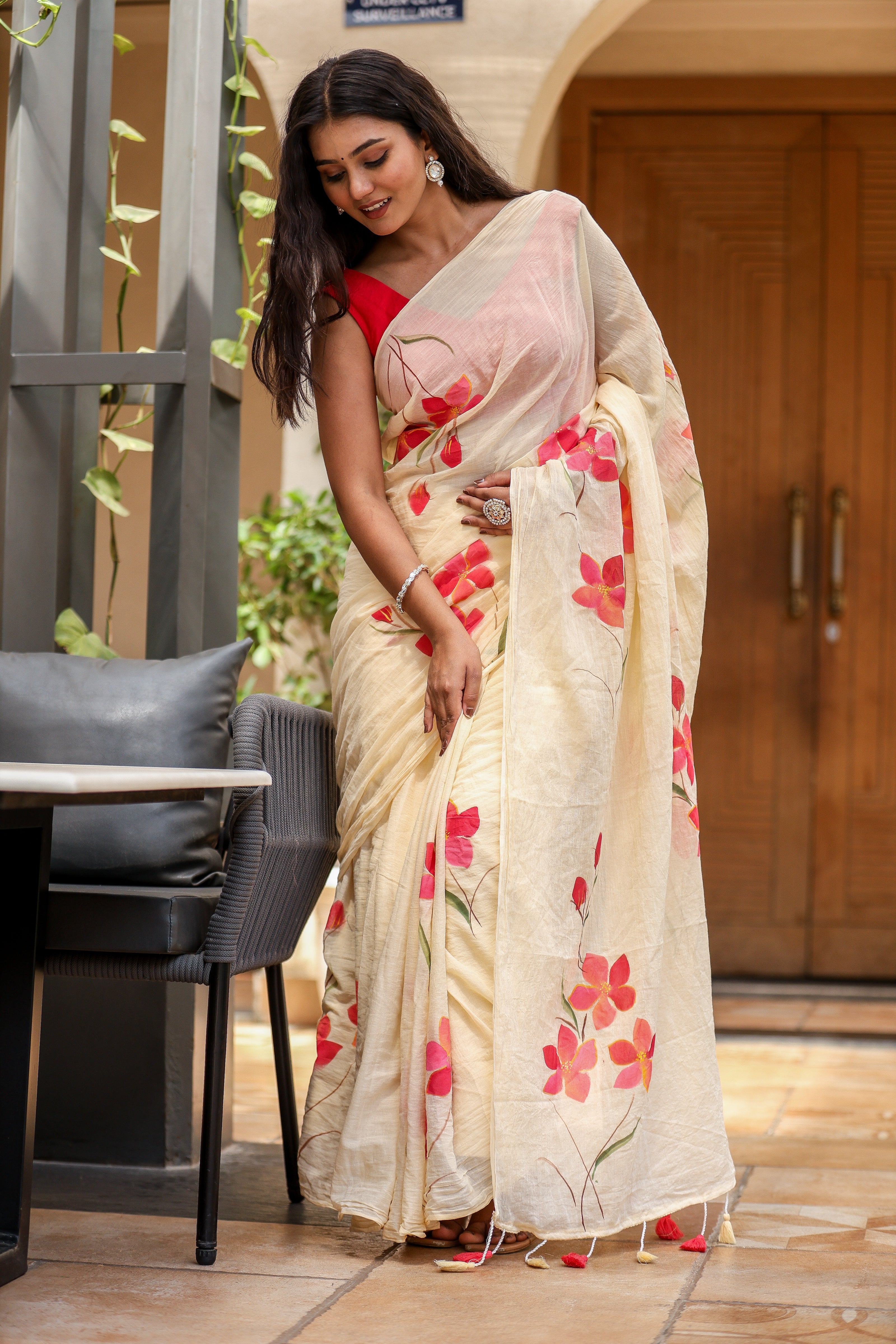 Petal Whisper (Handpainted Ivory Creme Malmal Saree)