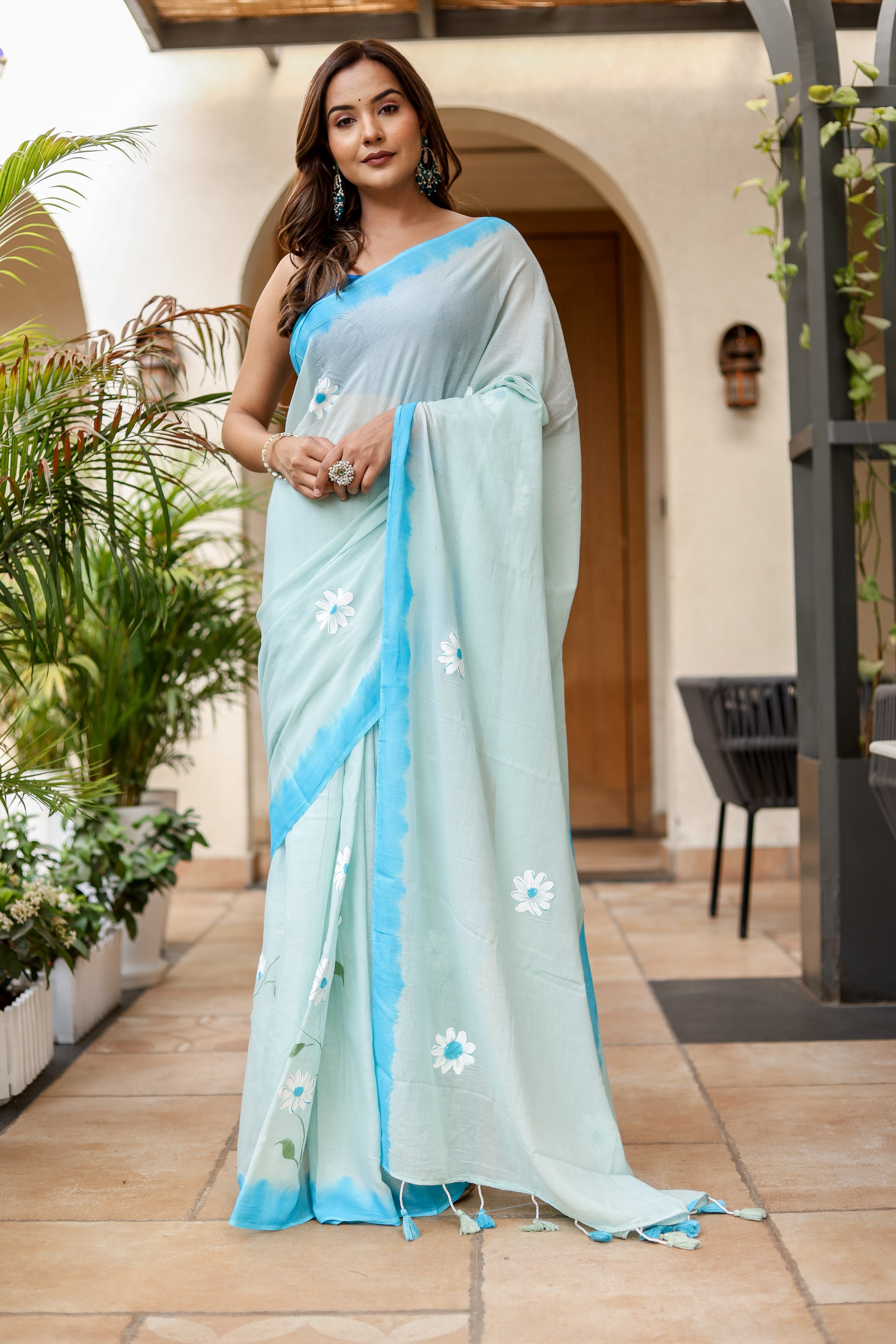 Sky Blossom (Handpainted Blue Malmal Saree)