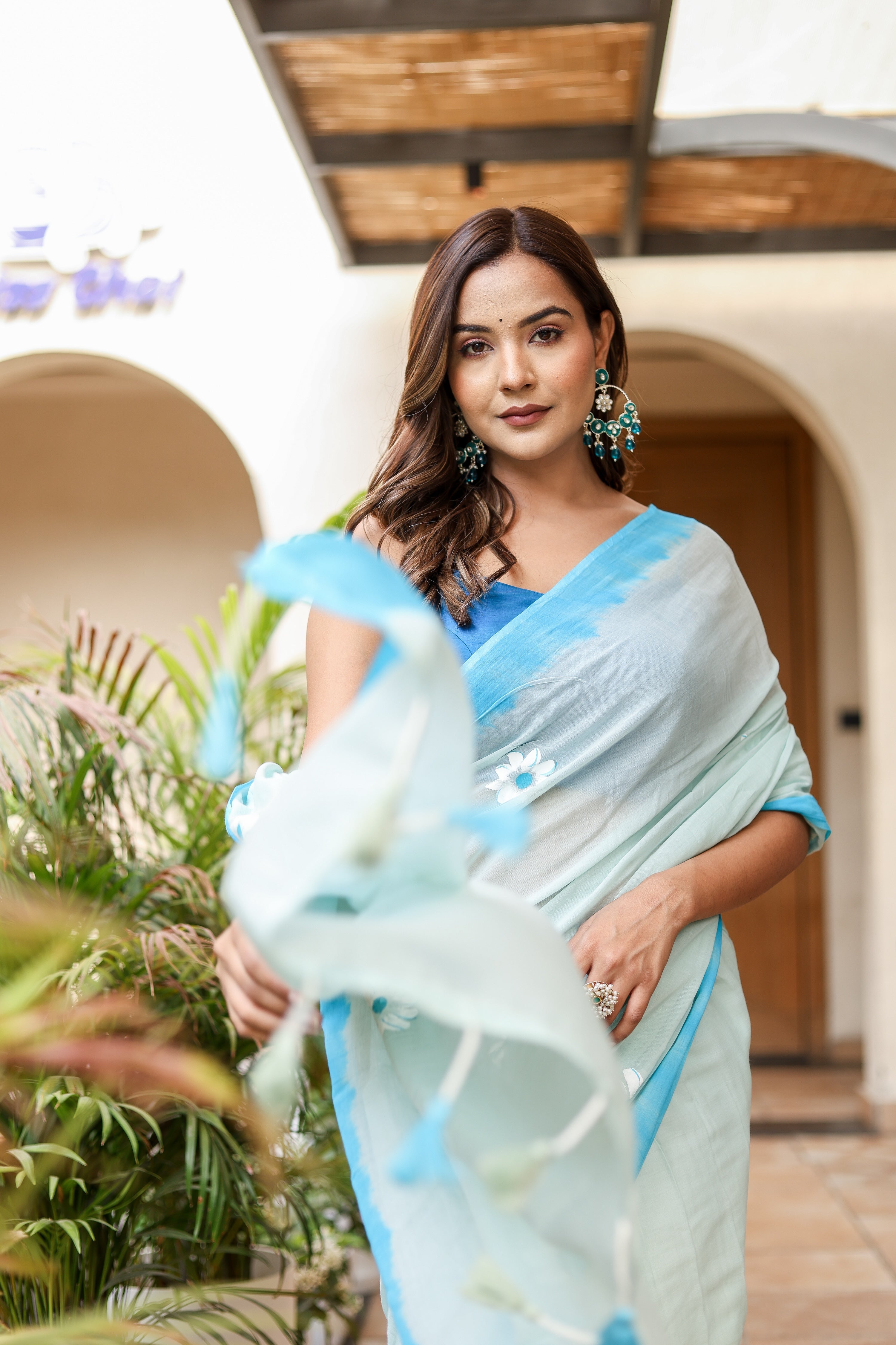 Sky Blossom (Handpainted Blue Malmal Saree)