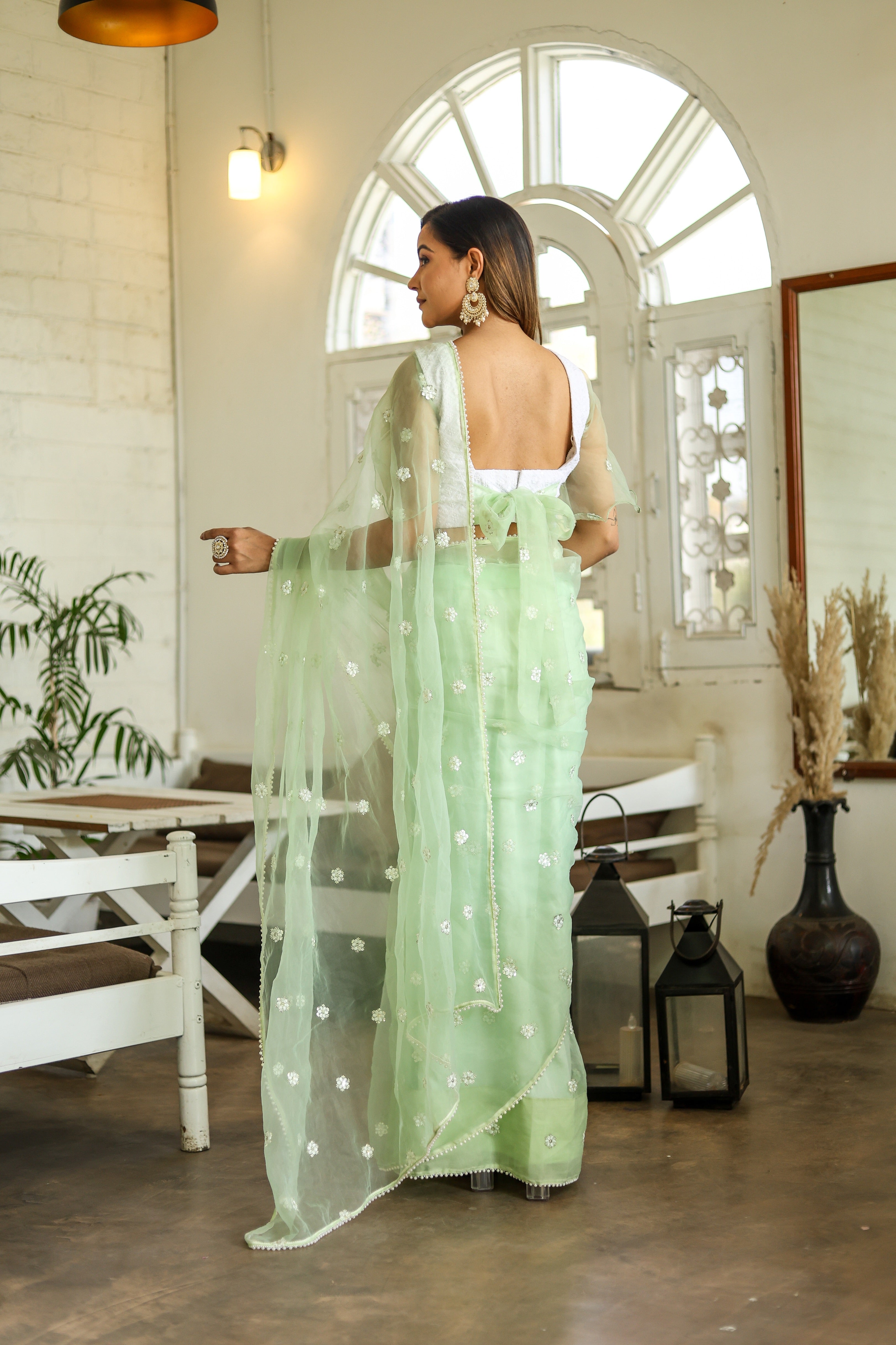 Emerald Enchantment (Embroidered Buttis Organza Pastel Green Saree)