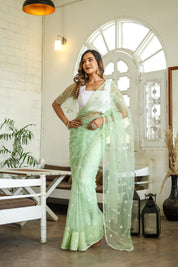 Emerald Enchantment (Embroidered Buttis Organza Pastel Green Saree)