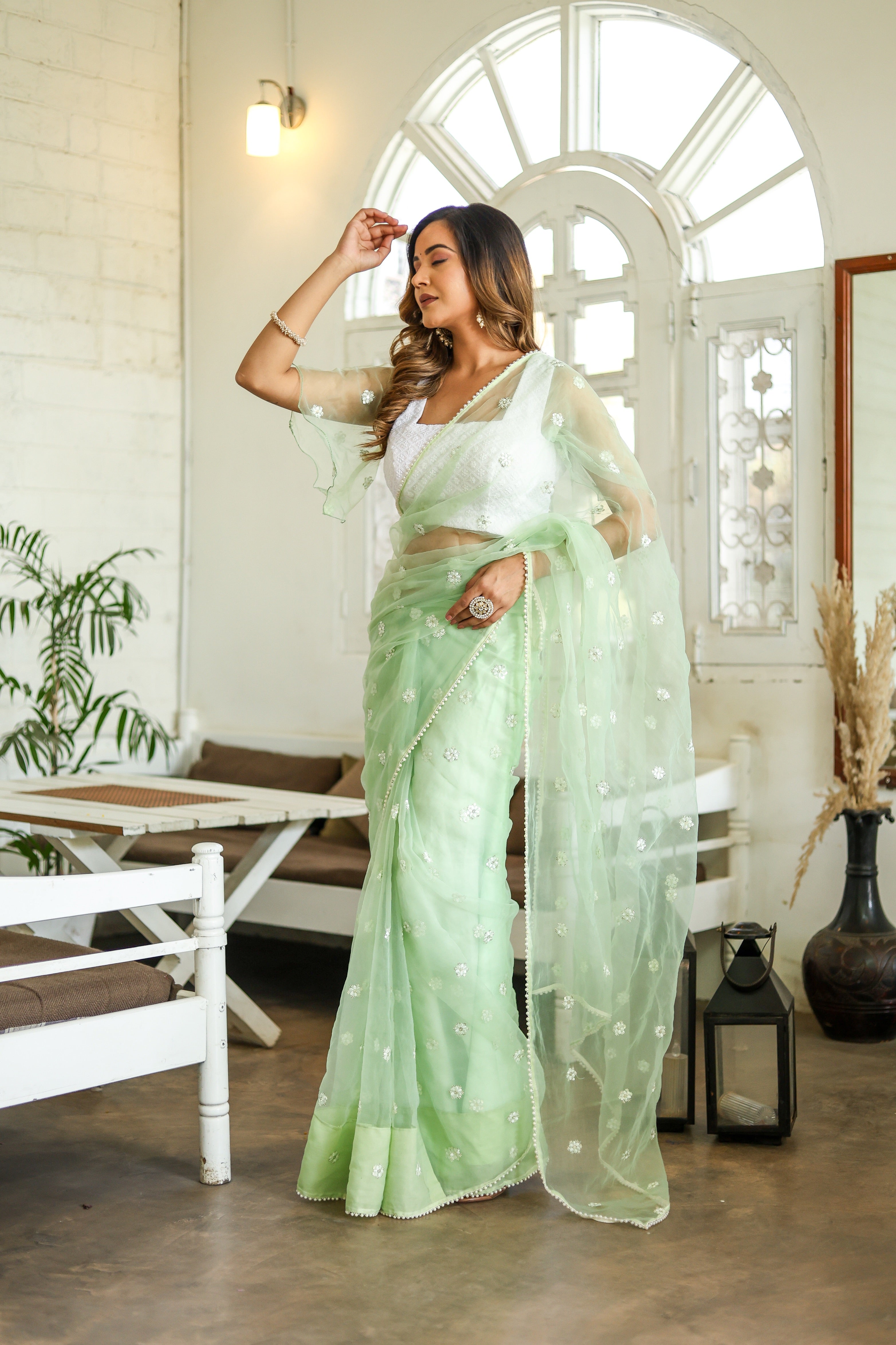 Emerald Enchantment (Embroidered Buttis Organza Pastel Green Saree)