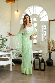 Emerald Enchantment (Embroidered Buttis Organza Pastel Green Saree)