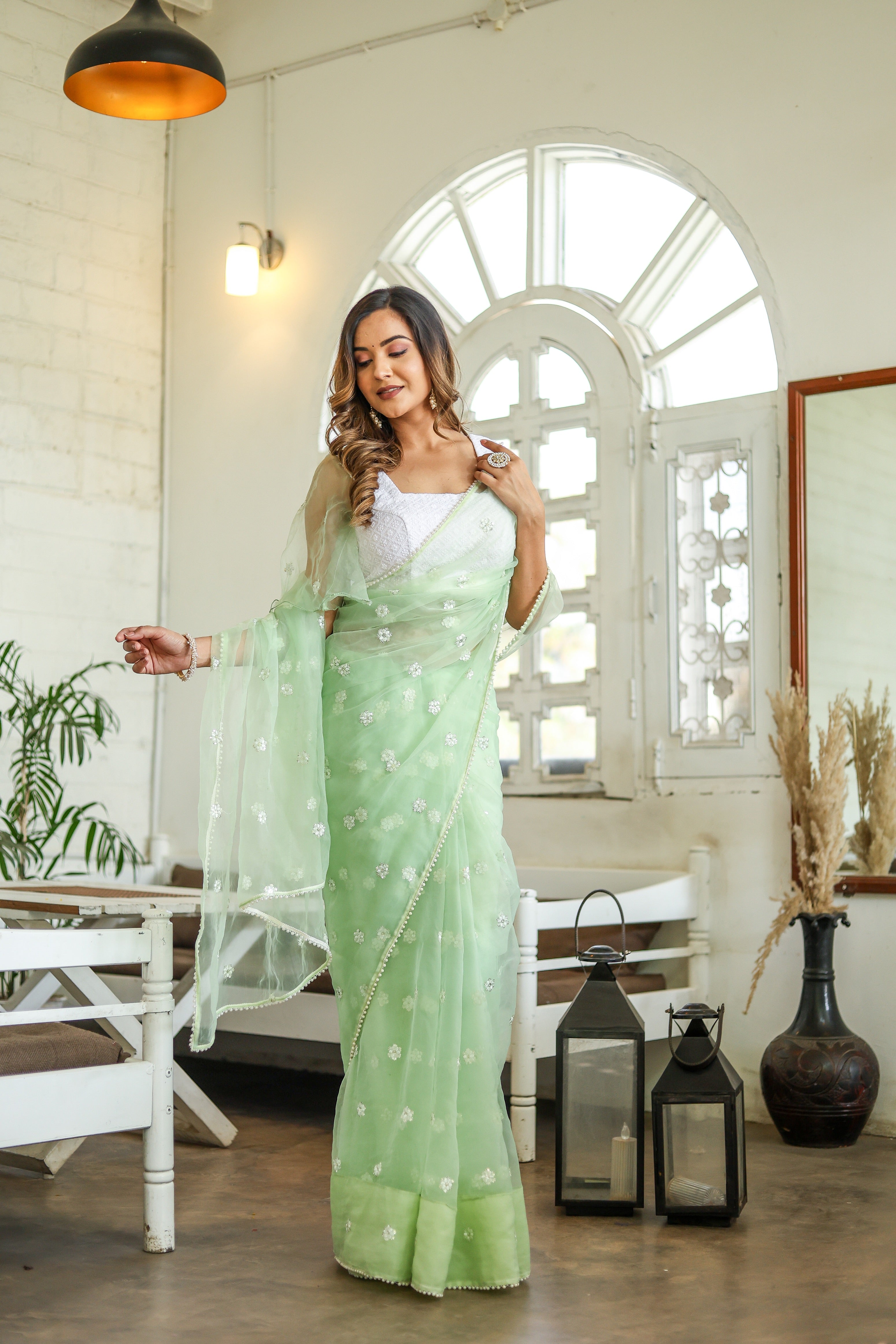 Emerald Enchantment (Embroidered Buttis Organza Pastel Green Saree)