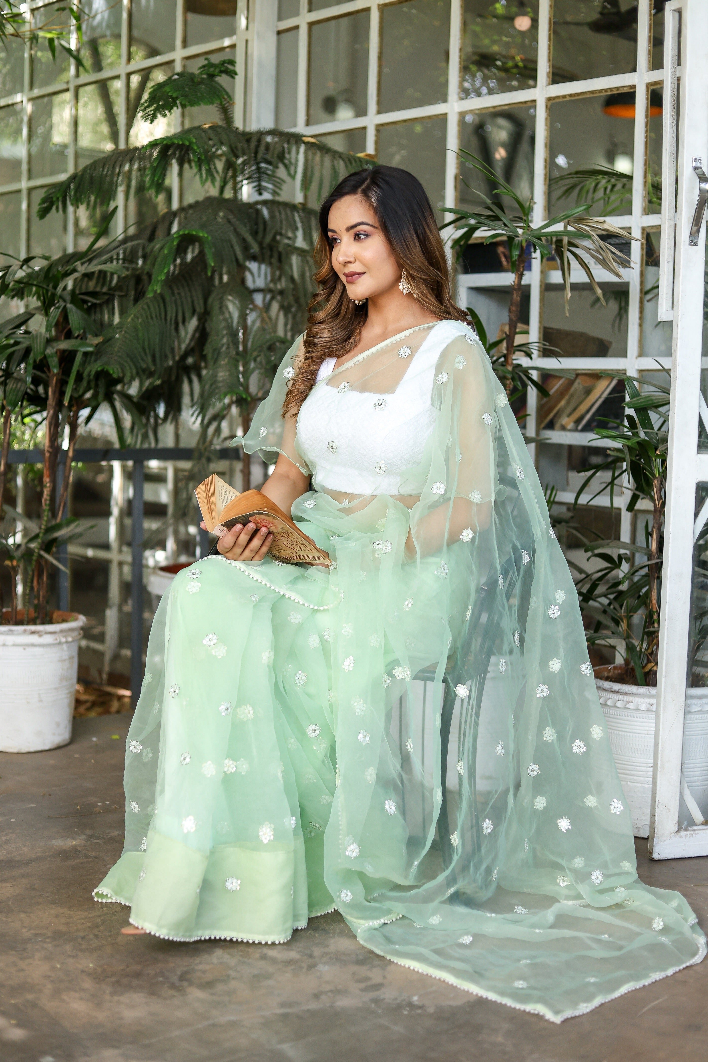 Emerald Enchantment (Embroidered Buttis Organza Pastel Green Saree)