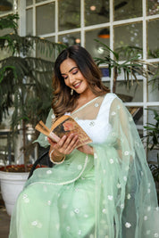 Emerald Enchantment (Embroidered Buttis Organza Pastel Green Saree)
