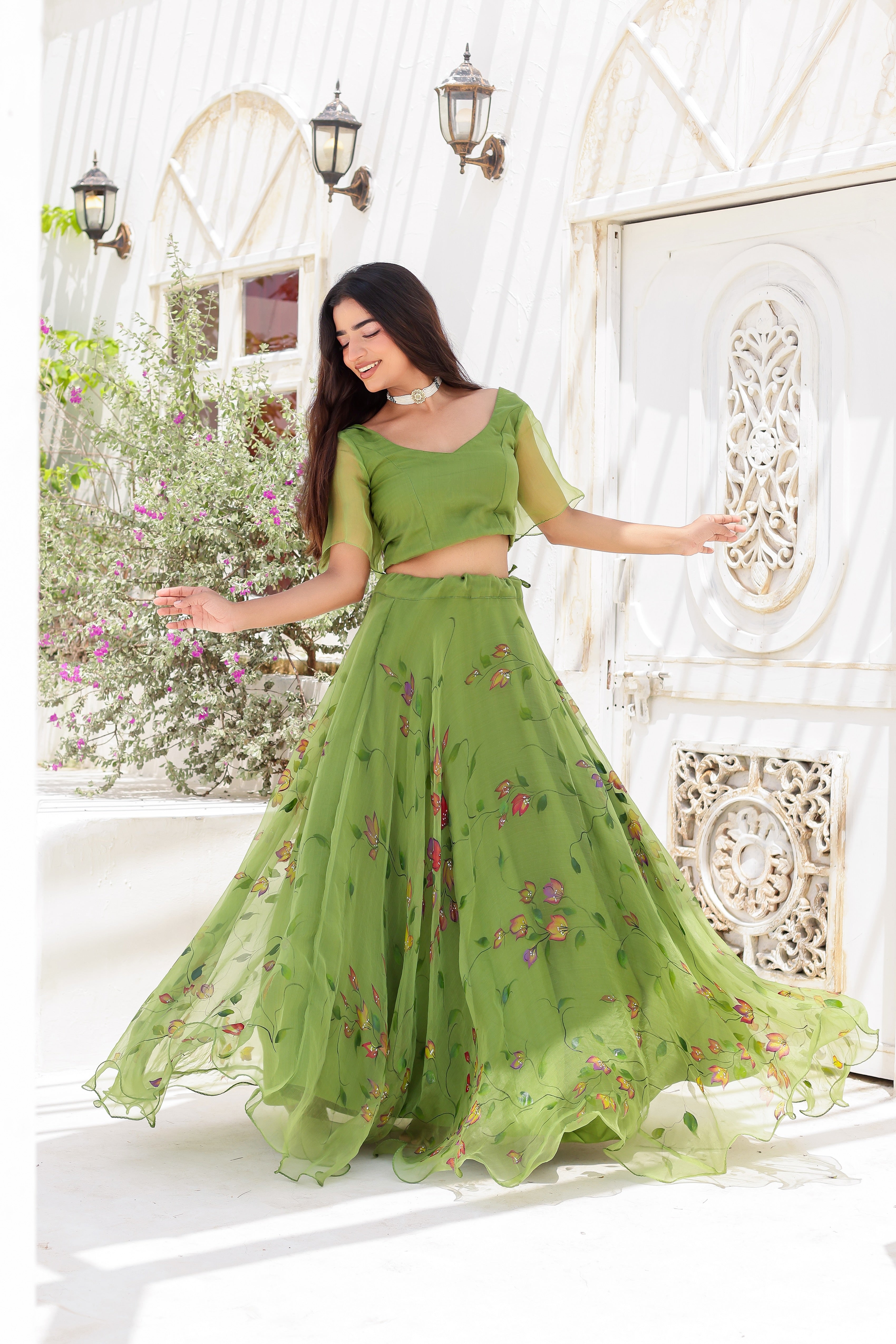 Raag Basant (Handpainted Green Lehenga on Pure Organza)