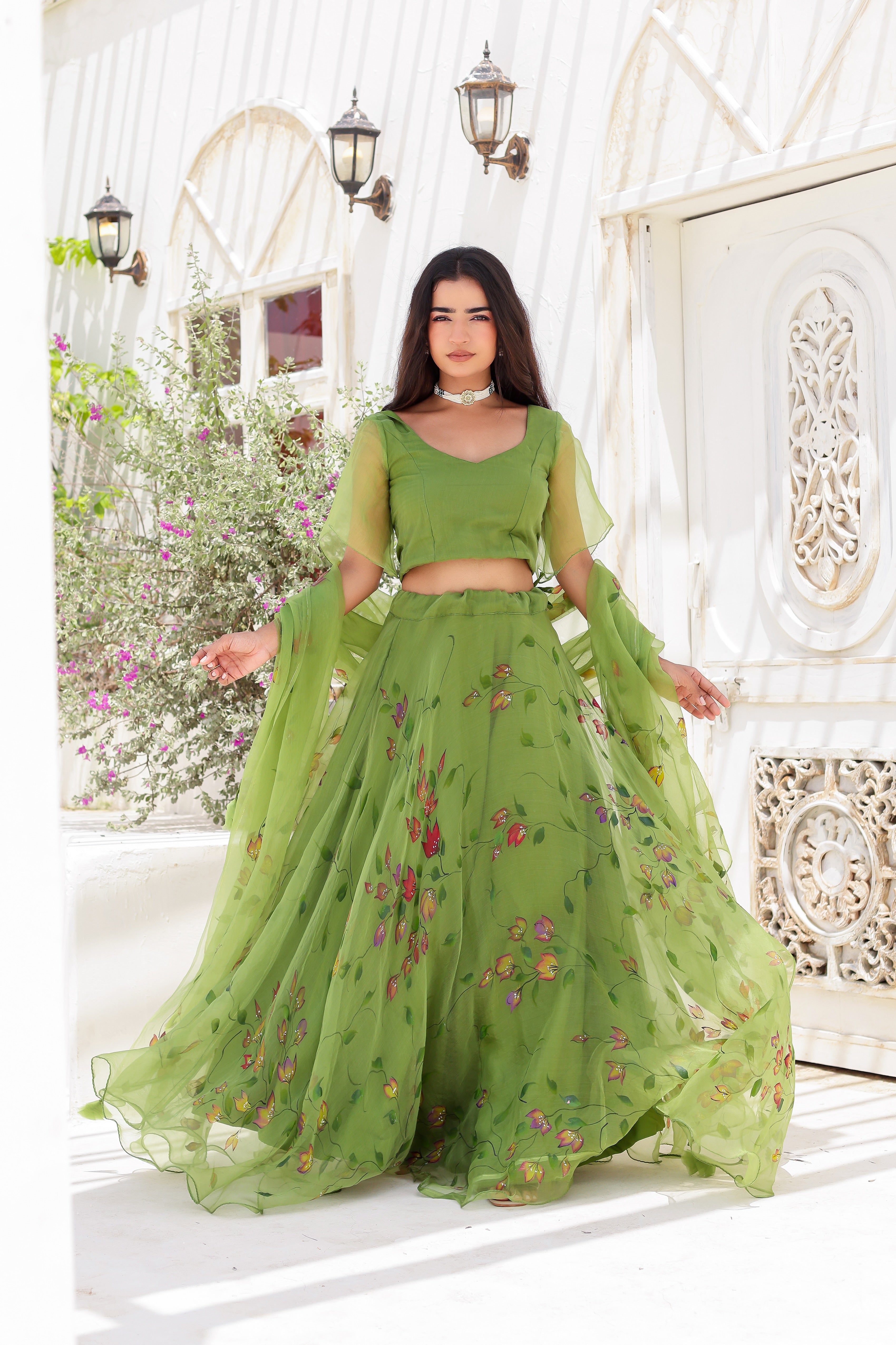 Raag Basant (Handpainted Green Lehenga on Pure Organza)