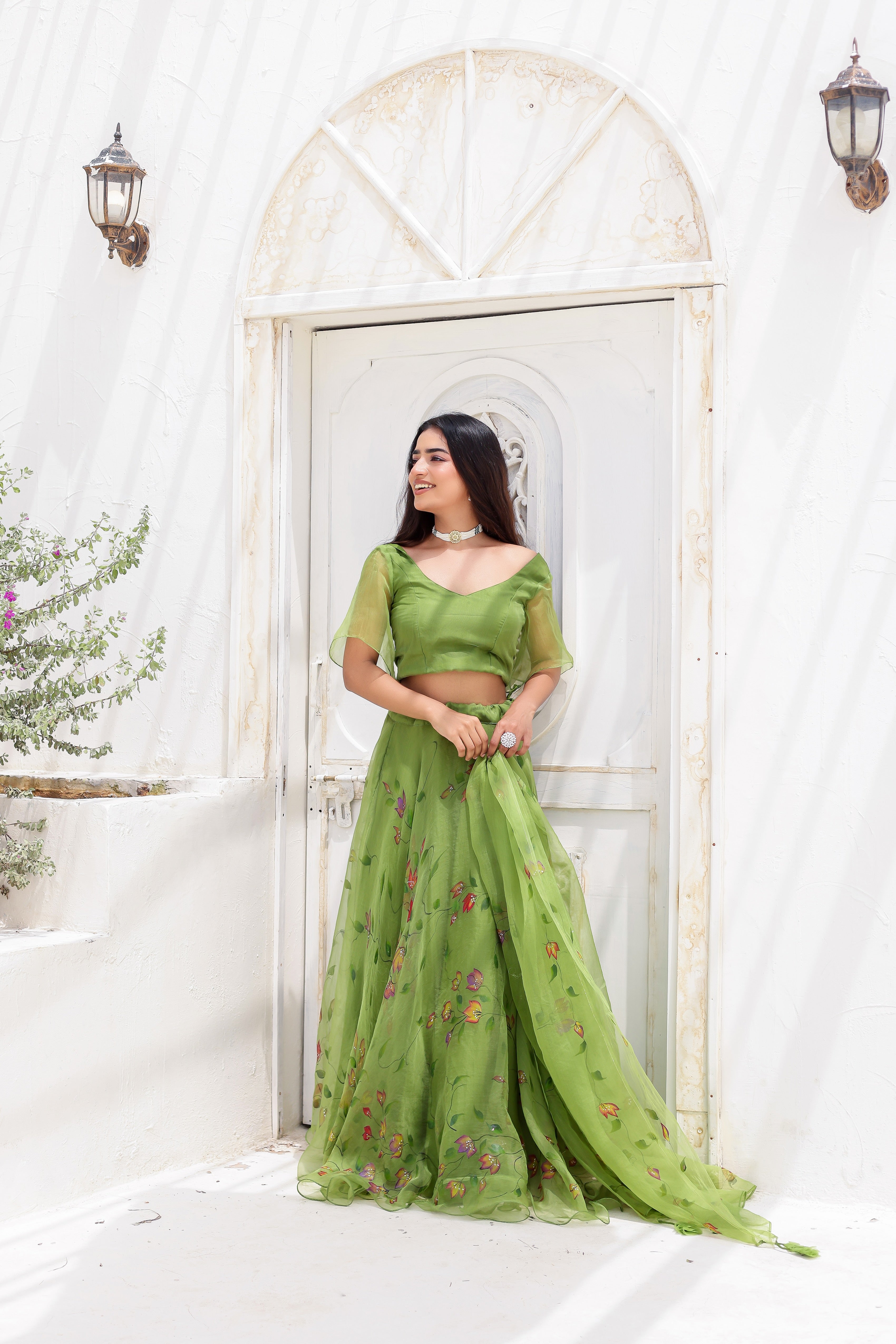 Raag Basant (Handpainted Green Lehenga on Pure Organza)