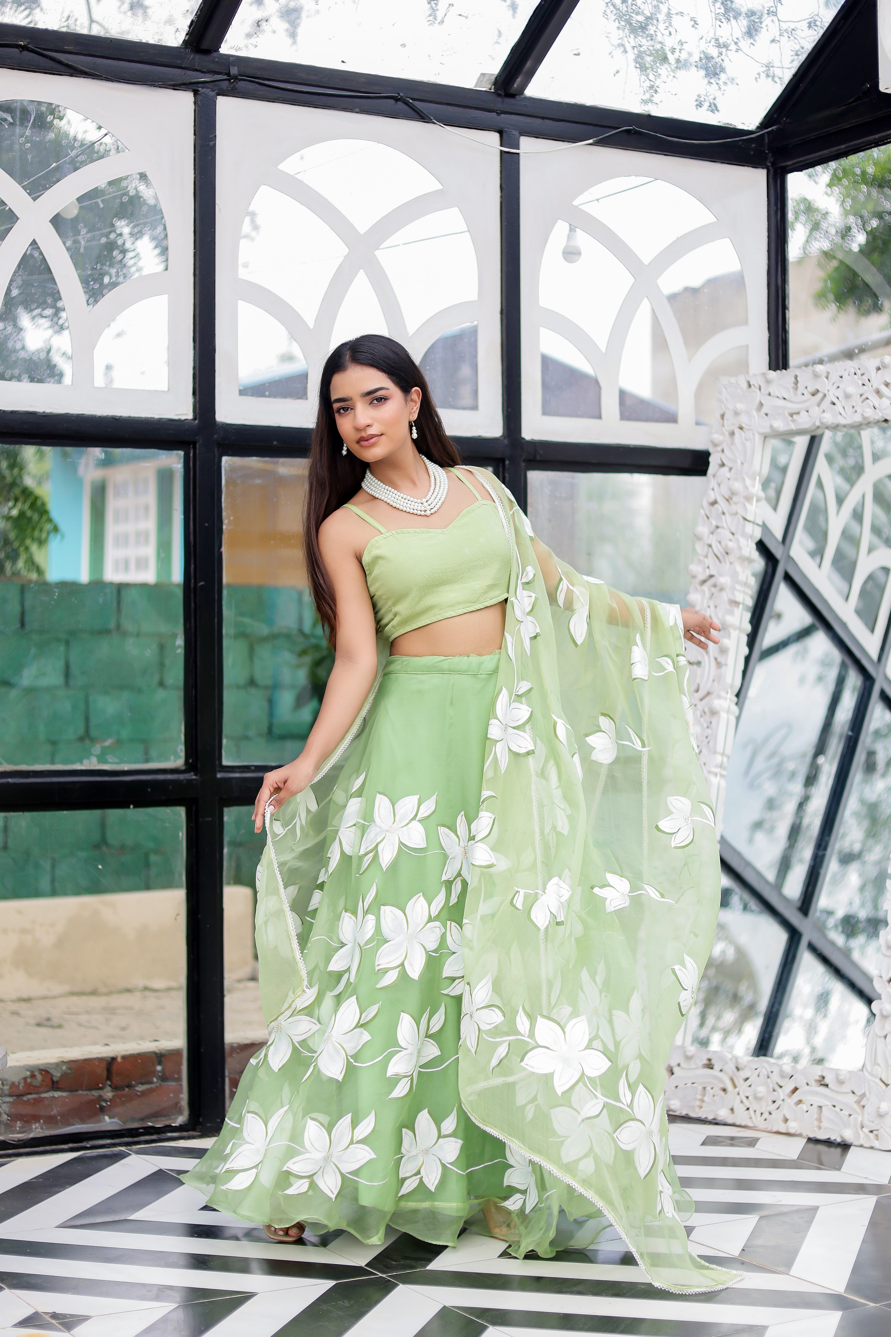 Raag Miyan ki Malhar (Handpainted Pastel Green Pure Organza Lehenga)