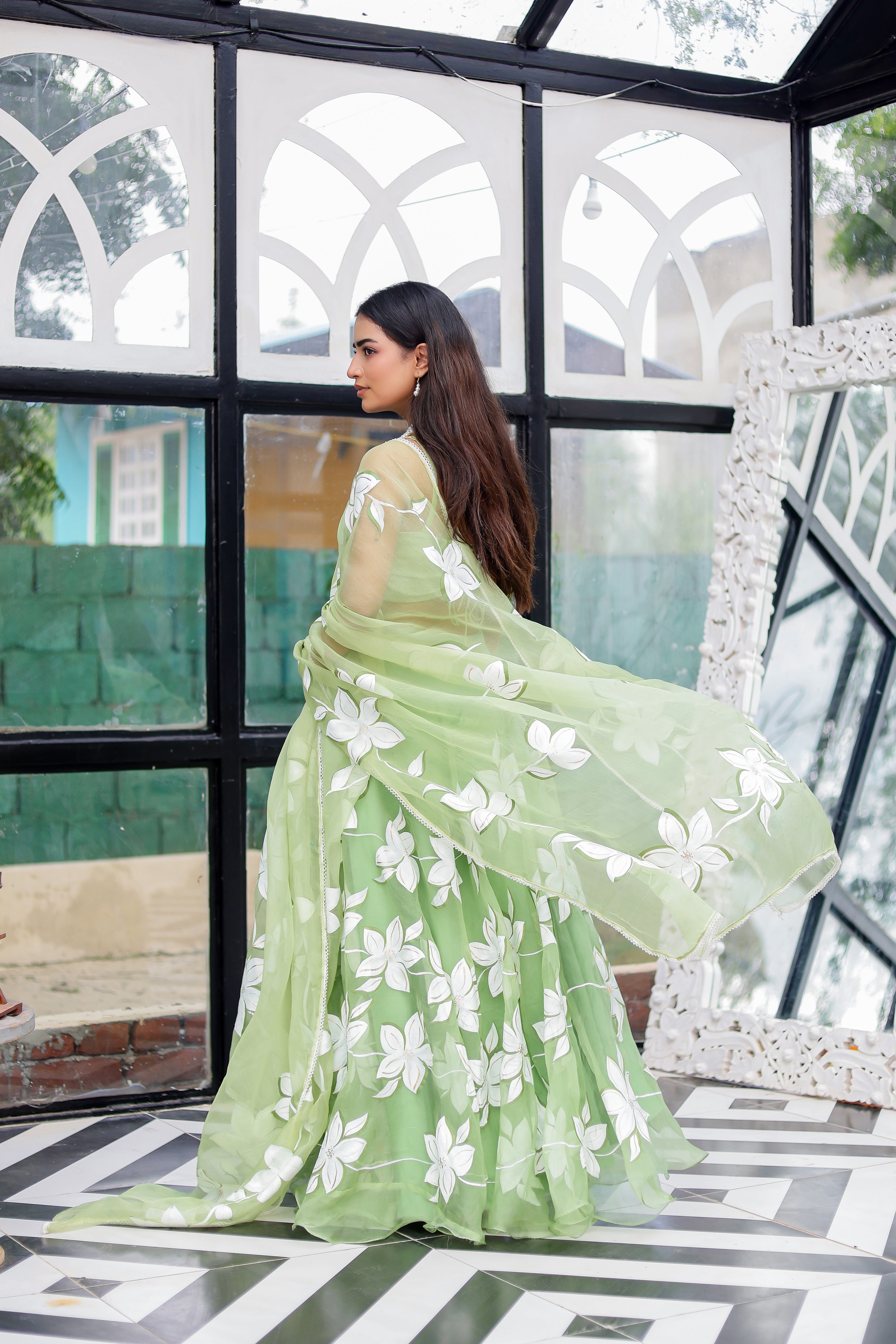 Raag Miyan ki Malhar (Handpainted Pastel Green Pure Organza Lehenga)