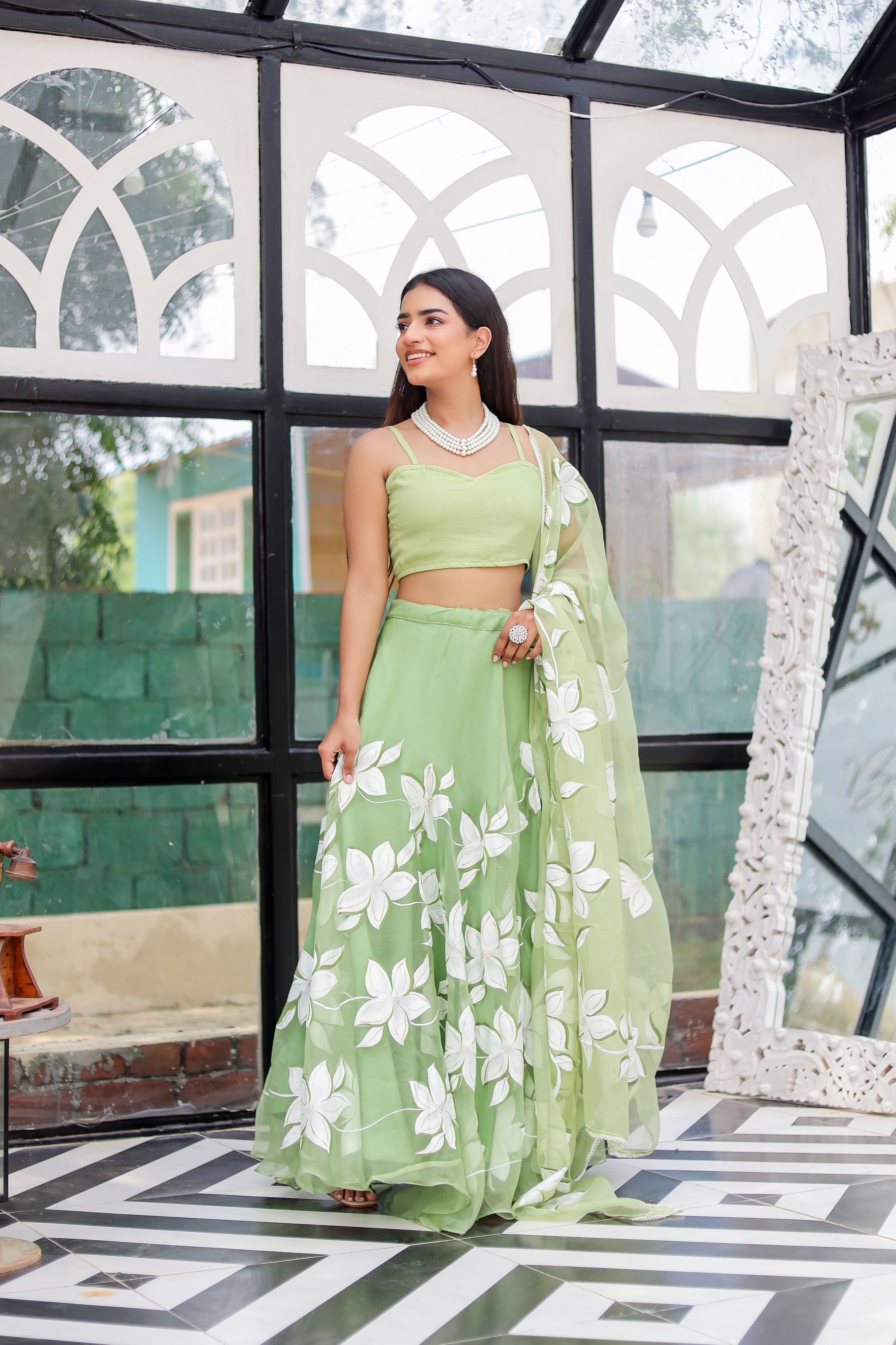 Raag Miyan ki Malhar (Handpainted Pastel Green Pure Organza Lehenga)