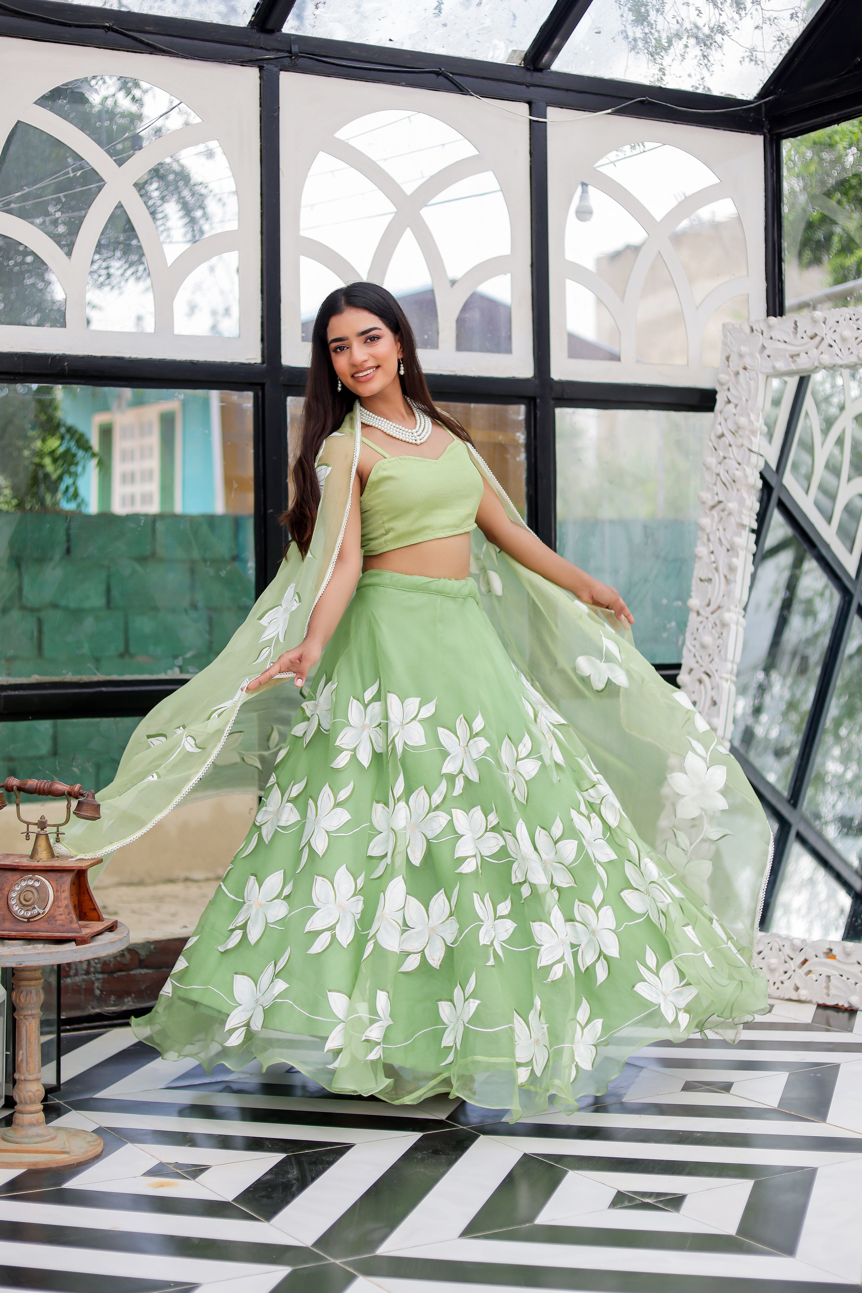Raag Miyan ki Malhar (Handpainted Pastel Green Pure Organza Lehenga)