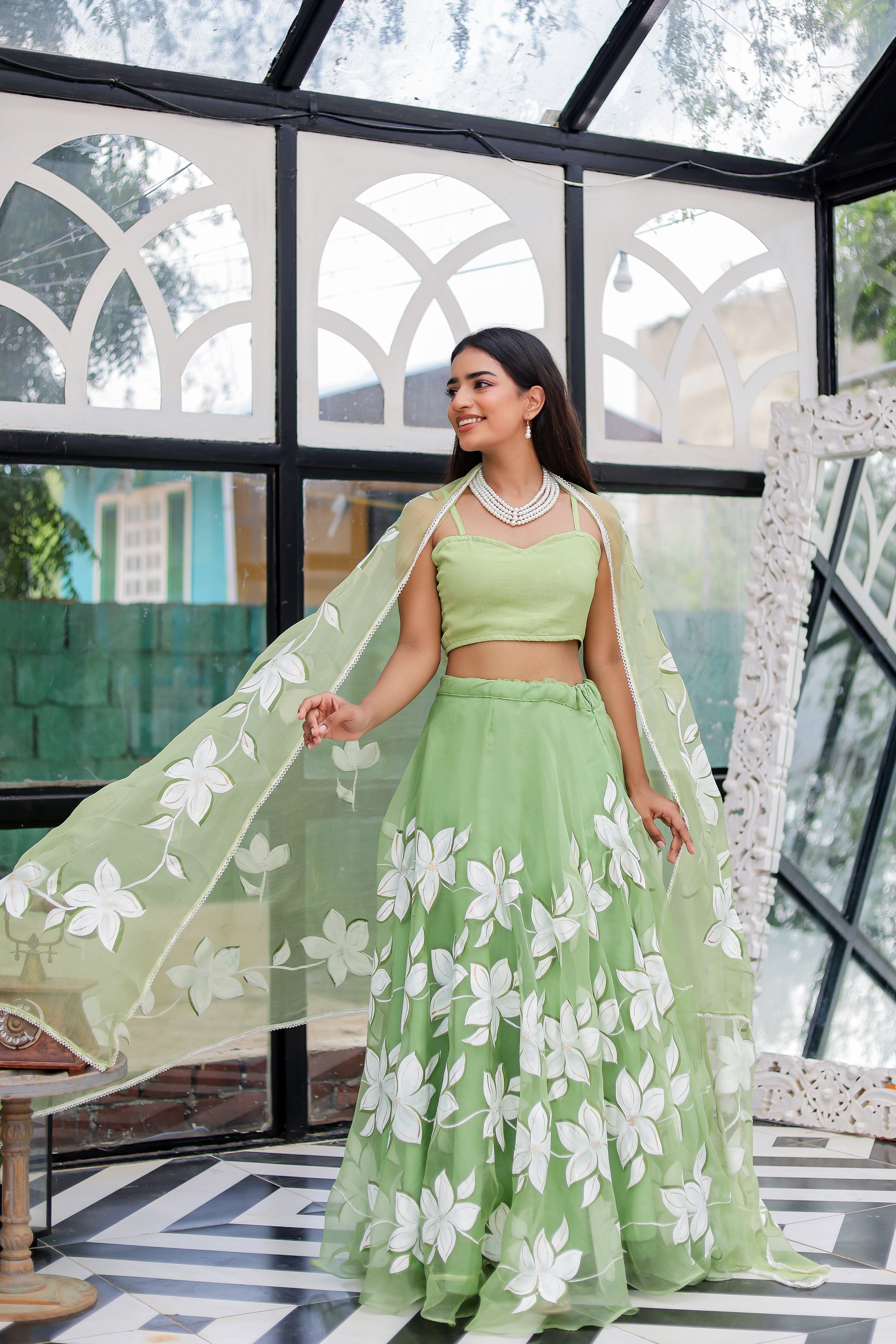 Raag Miyan ki Malhar (Handpainted Pastel Green Pure Organza Lehenga)