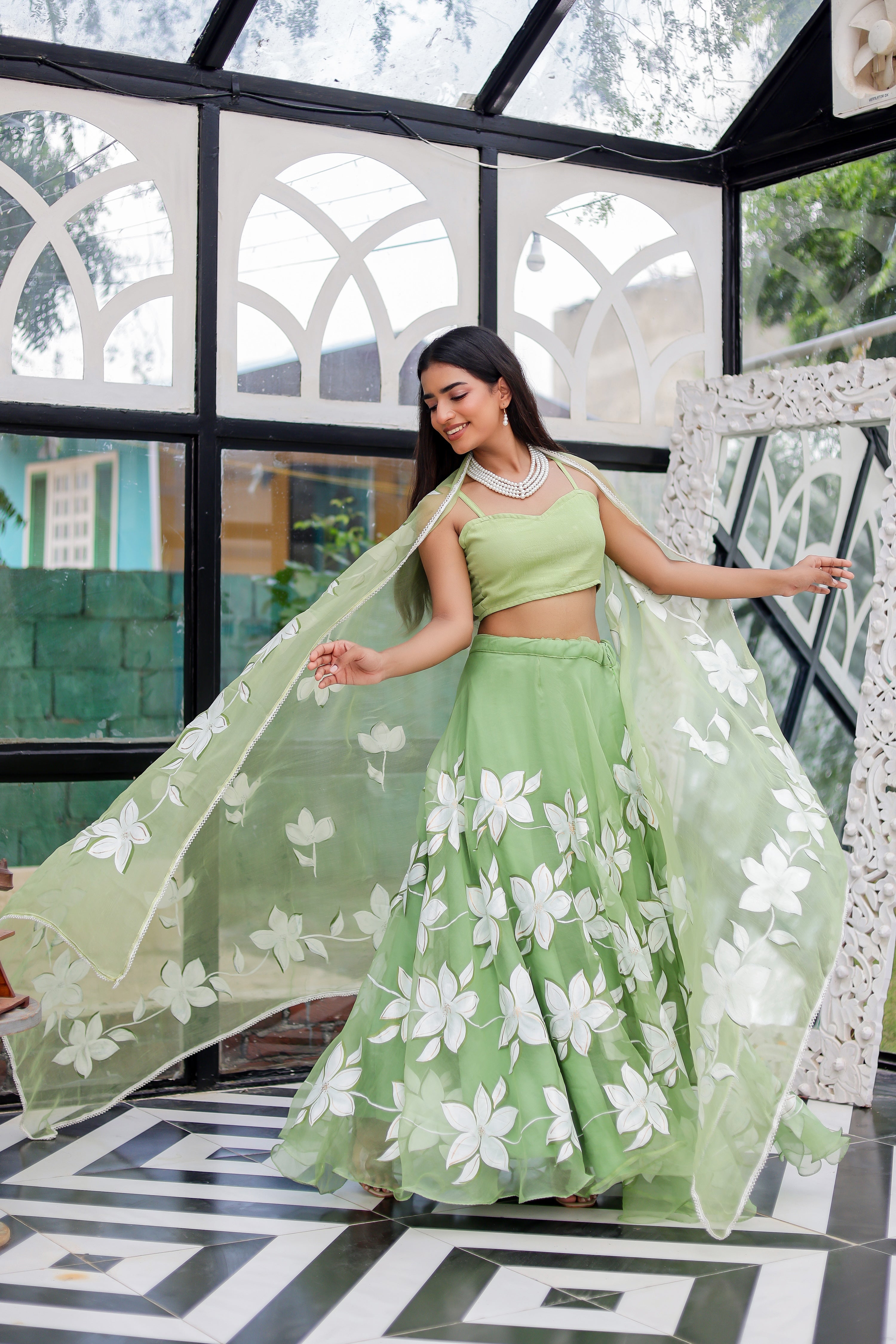 Raag Miyan ki Malhar (Handpainted Pastel Green Pure Organza Lehenga)