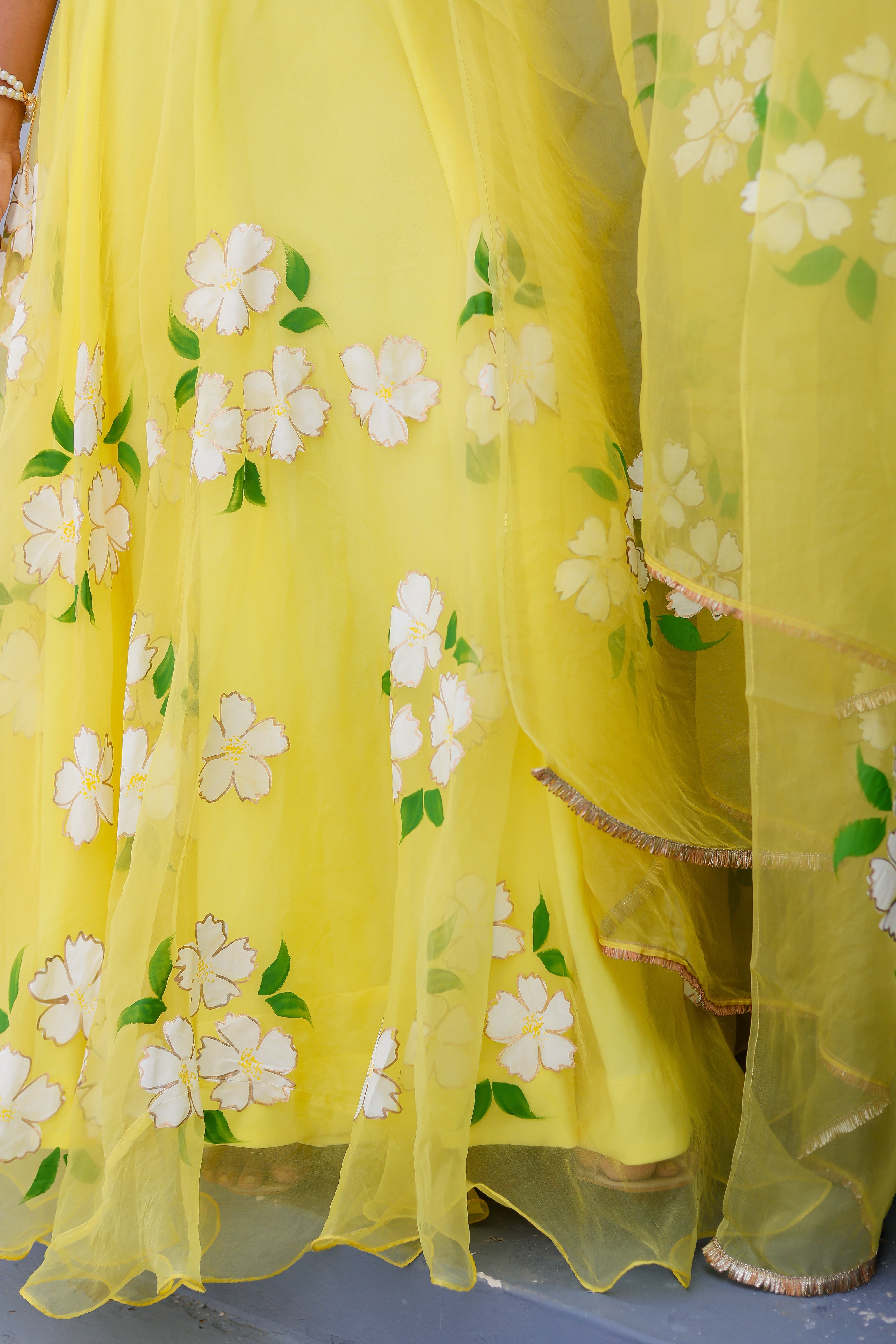 Raag Tilak Kamod (Handpainted Yellow Pure Organza Lehenga)