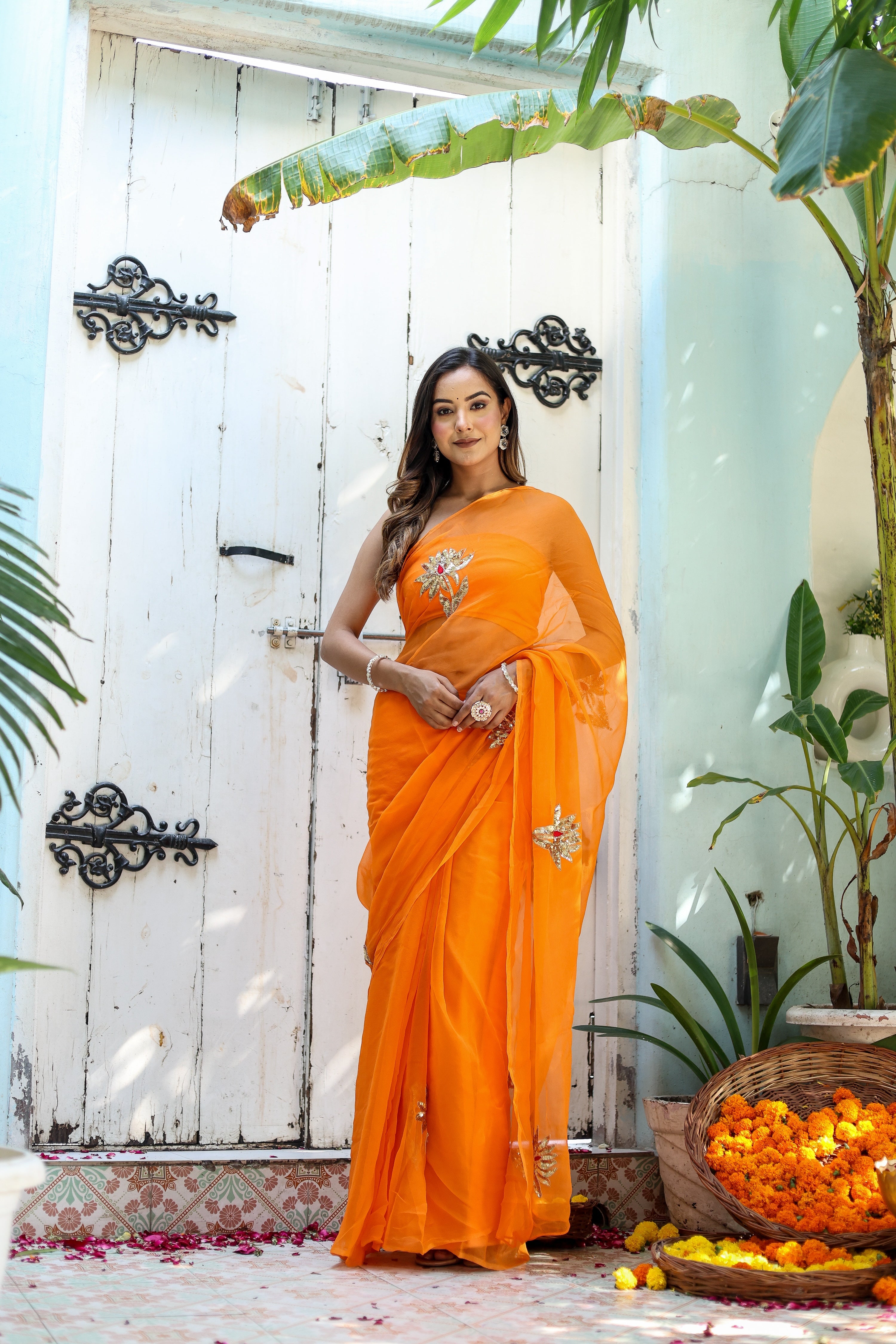 Artful Wrap (Hand Embroidered Chiffon Orange Saree)