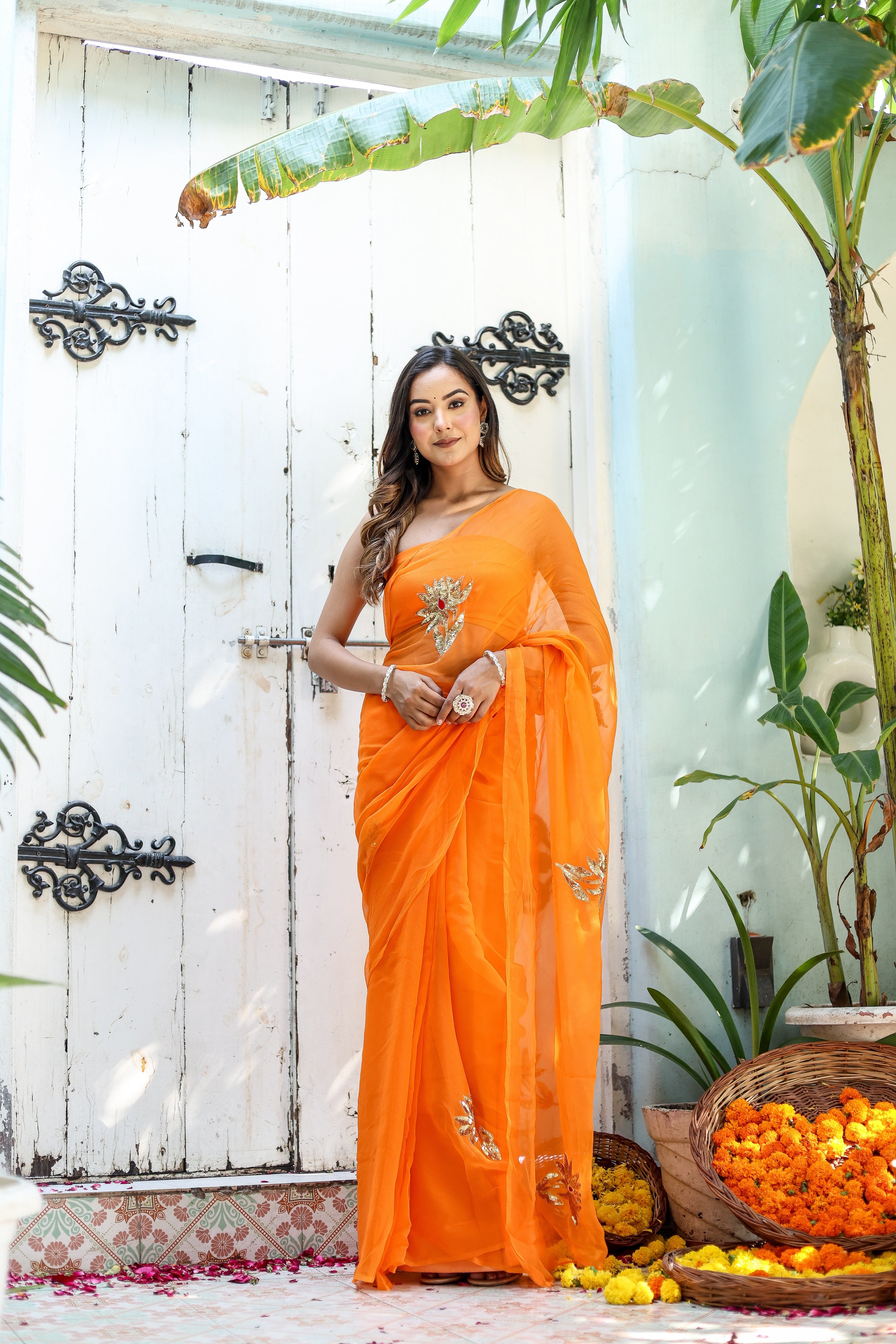 Artful Wrap (Hand Embroidered Chiffon Orange Saree)