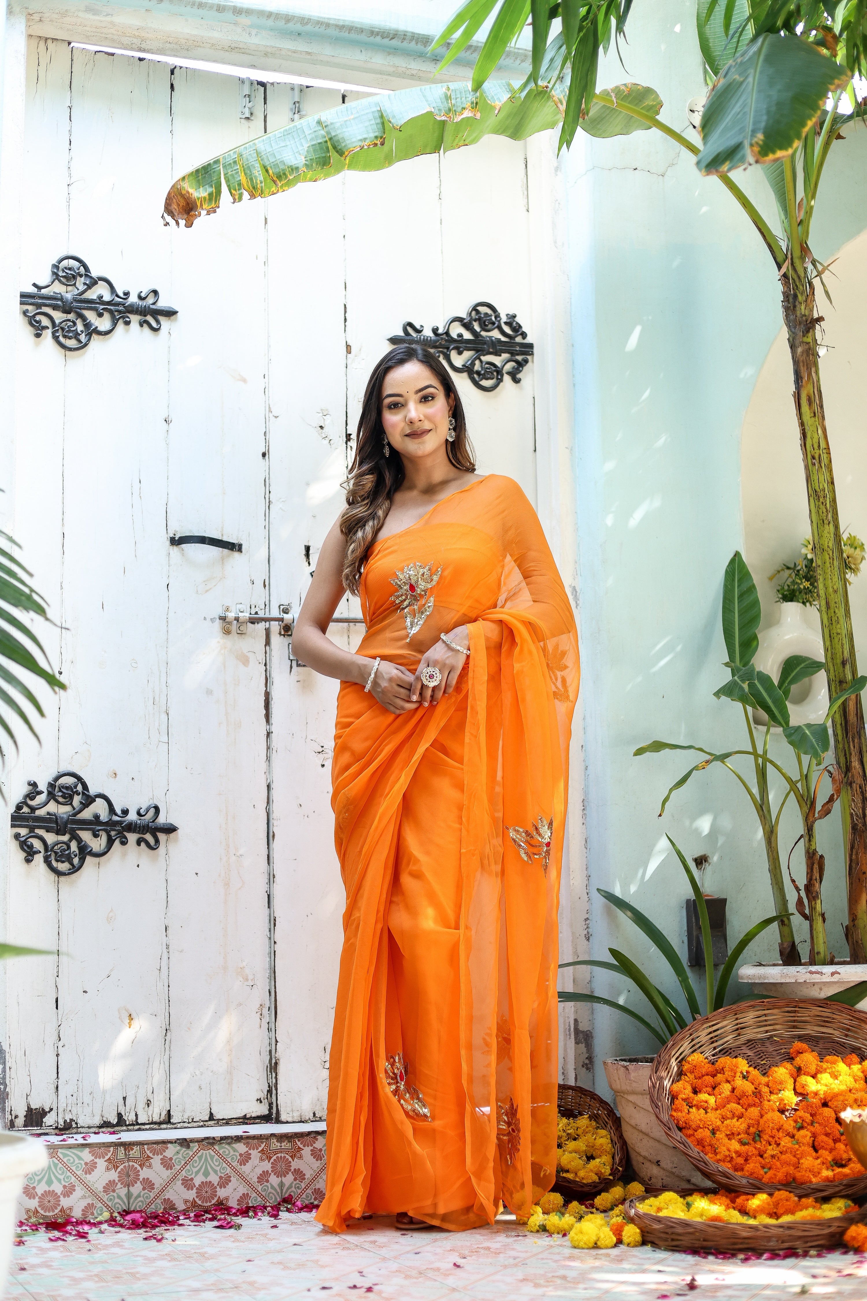 Artful Wrap (Hand Embroidered Chiffon Orange Saree)