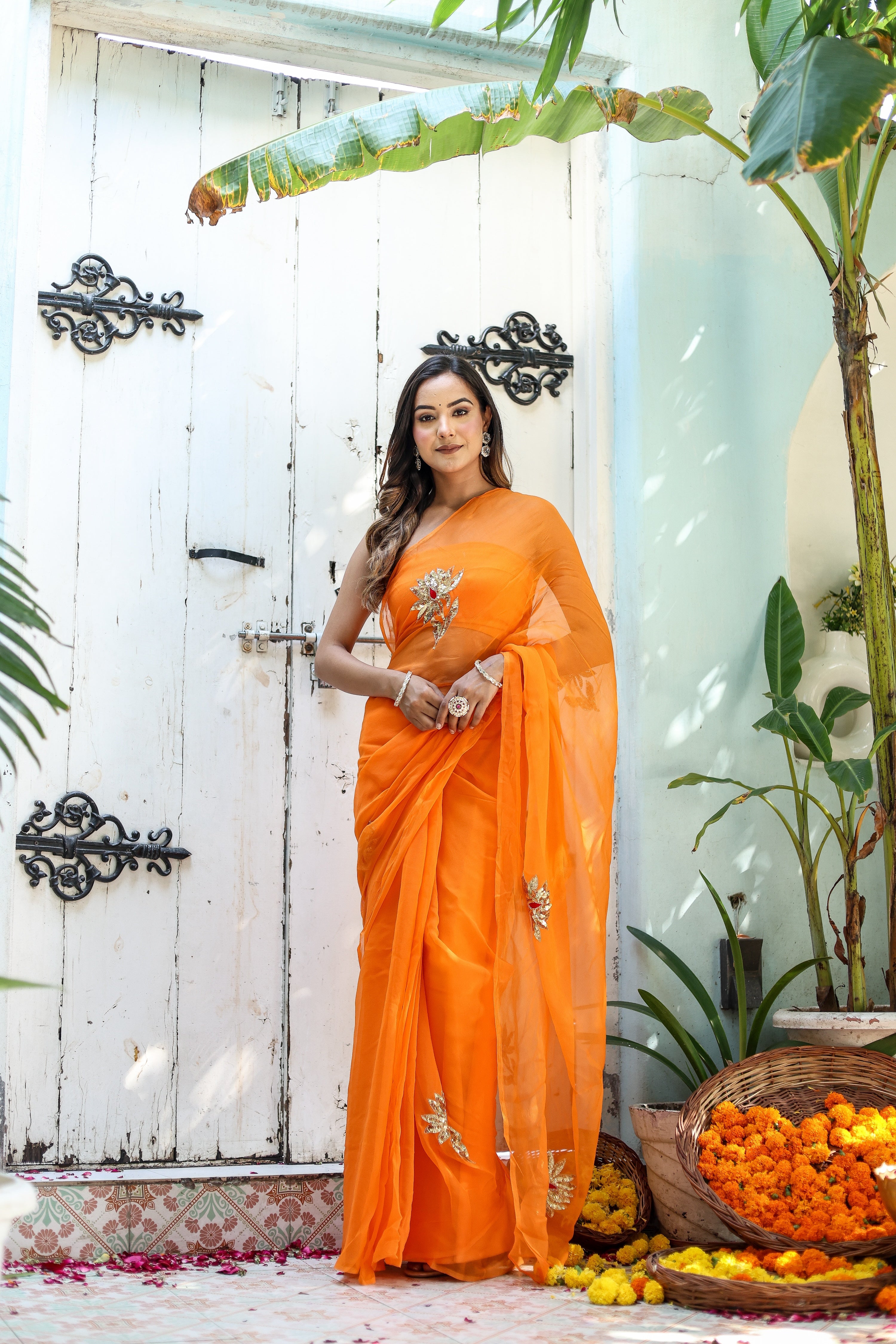 Artful Wrap (Hand Embroidered Chiffon Orange Saree)