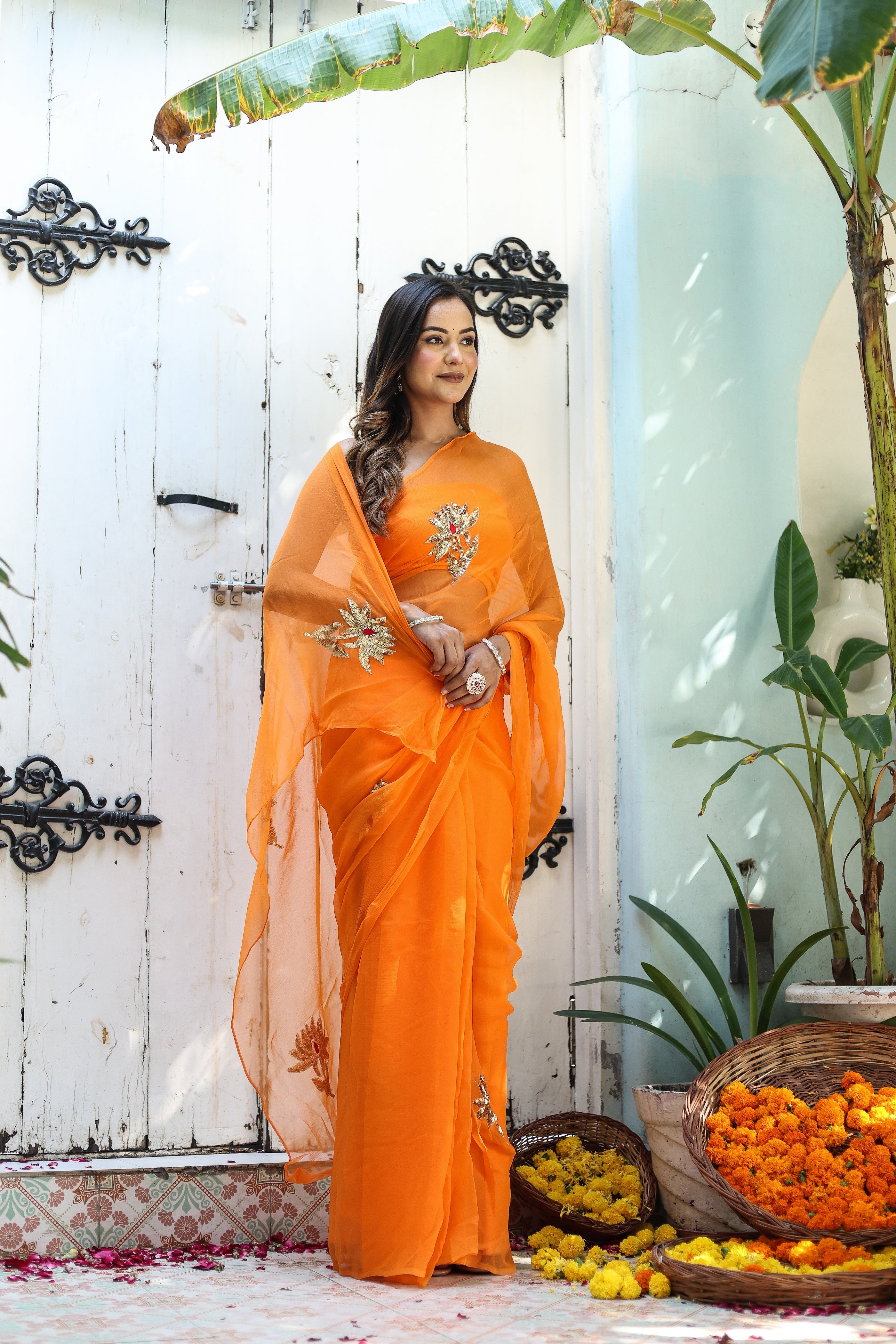 Artful Wrap (Hand Embroidered Chiffon Orange Saree)