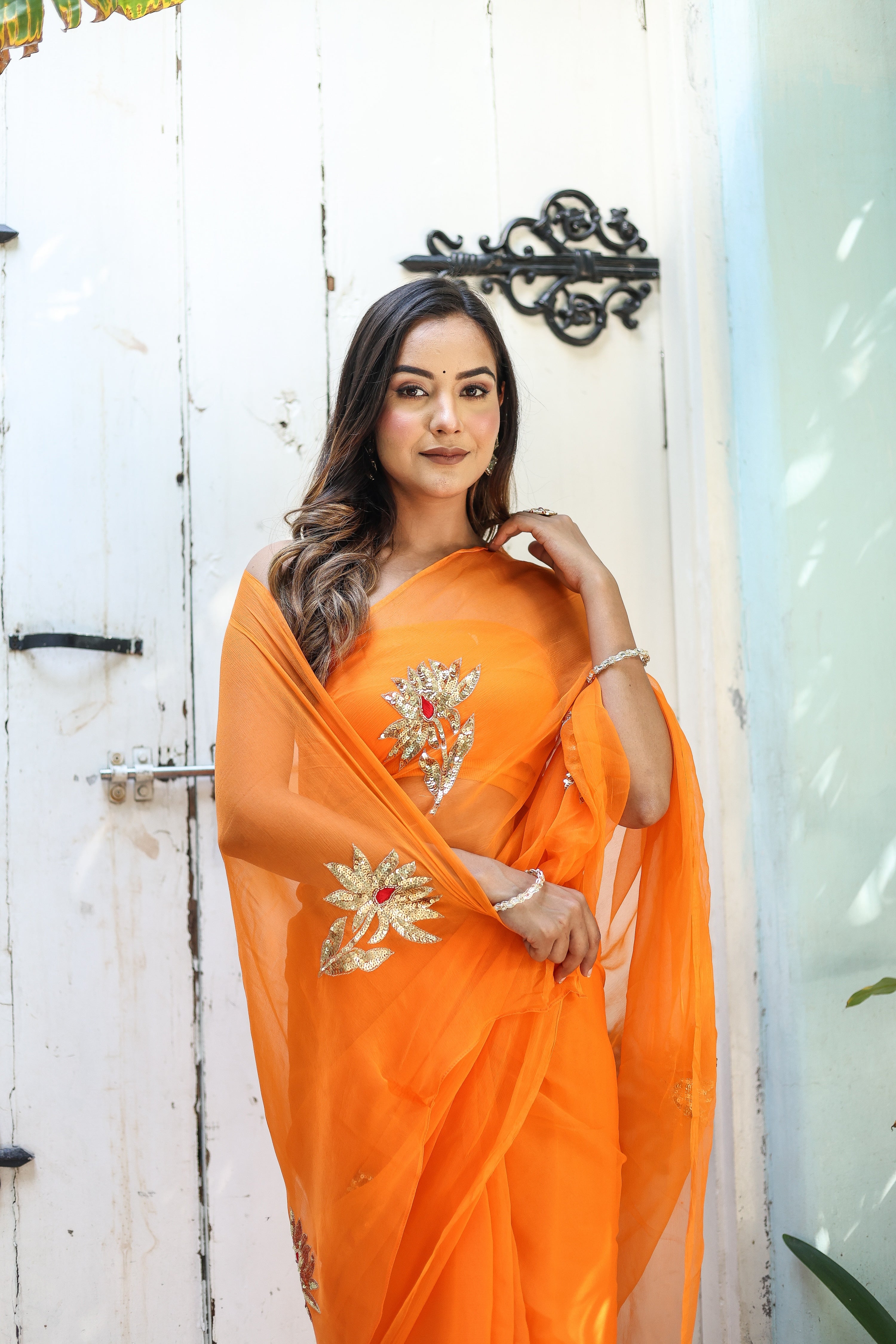 Artful Wrap (Hand Embroidered Chiffon Orange Saree)