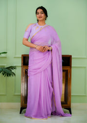 Mauve Glow  (Lavendar Chiffon Zari Border Saree)