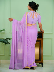 Mauve Glow  (Lavendar Chiffon Zari Border Saree)