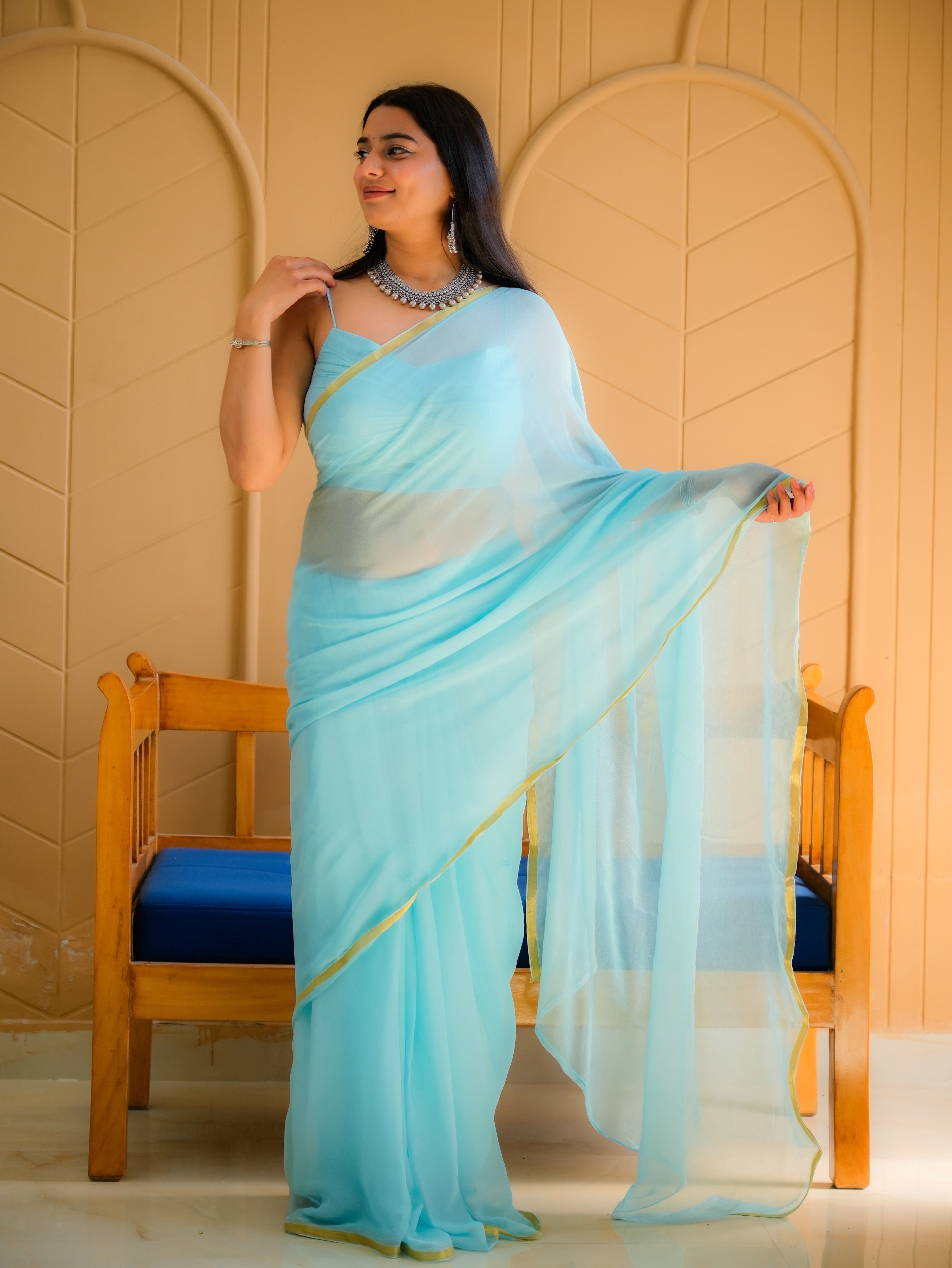 Cyan Glow (Cyan Chiffon Zari Border Saree)