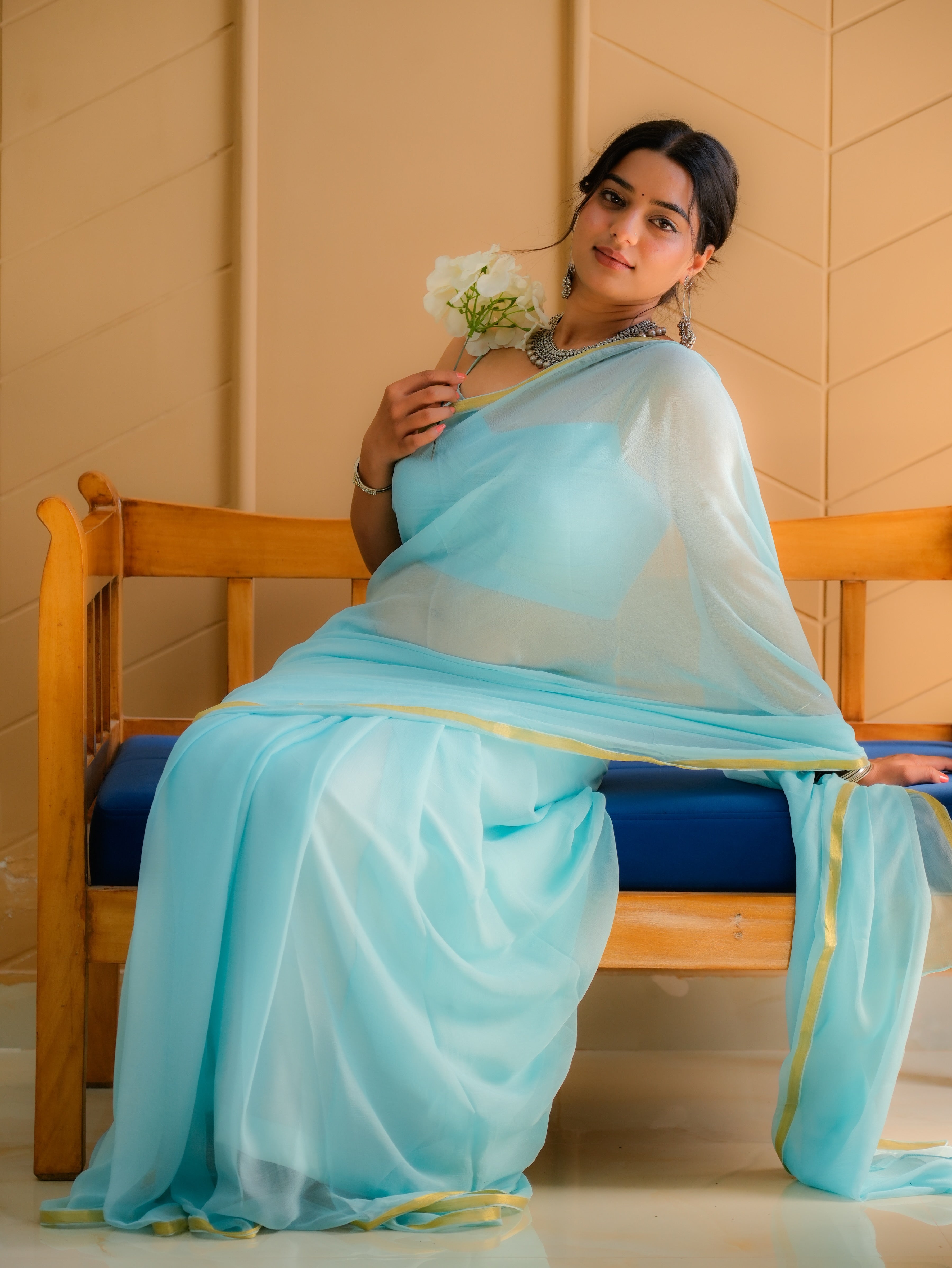 Cyan Glow (Cyan Chiffon Zari Border Saree)