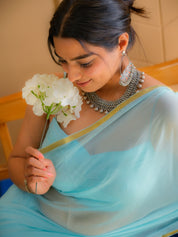 Cyan Glow (Cyan Chiffon Zari Border Saree)