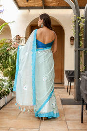 Sky Blossom (Handpainted Blue Malmal Saree)
