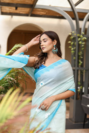 Sky Blossom (Handpainted Blue Malmal Saree)