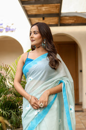 Sky Blossom (Handpainted Blue Malmal Saree)
