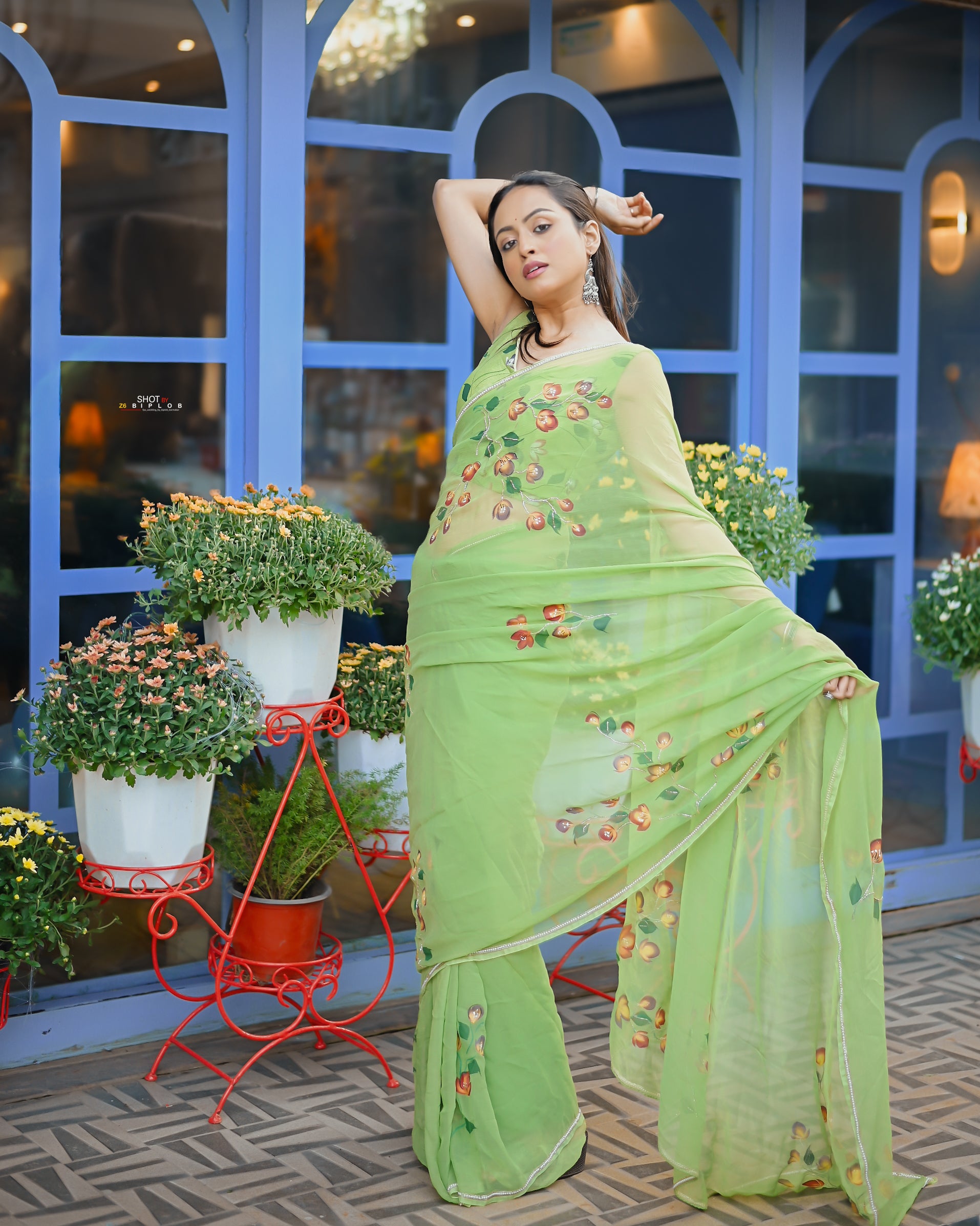 Pistachio Petals (Handpainted pure viscose chiffon saree with handwork of cutdana)