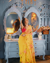 Golden Bloom Reverie (Handpainted pure viscose yellow chiffon saree with sequins work)