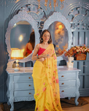 Golden Bloom Reverie (Handpainted pure viscose yellow chiffon saree with sequins work)