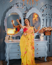 Golden Bloom Reverie (Handpainted pure viscose yellow chiffon saree with sequins work)