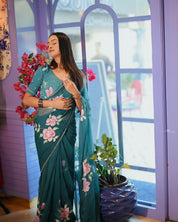 Teal Rose Serenade (Handpainted pure viscose chiffon saree with hand-embroidery)
