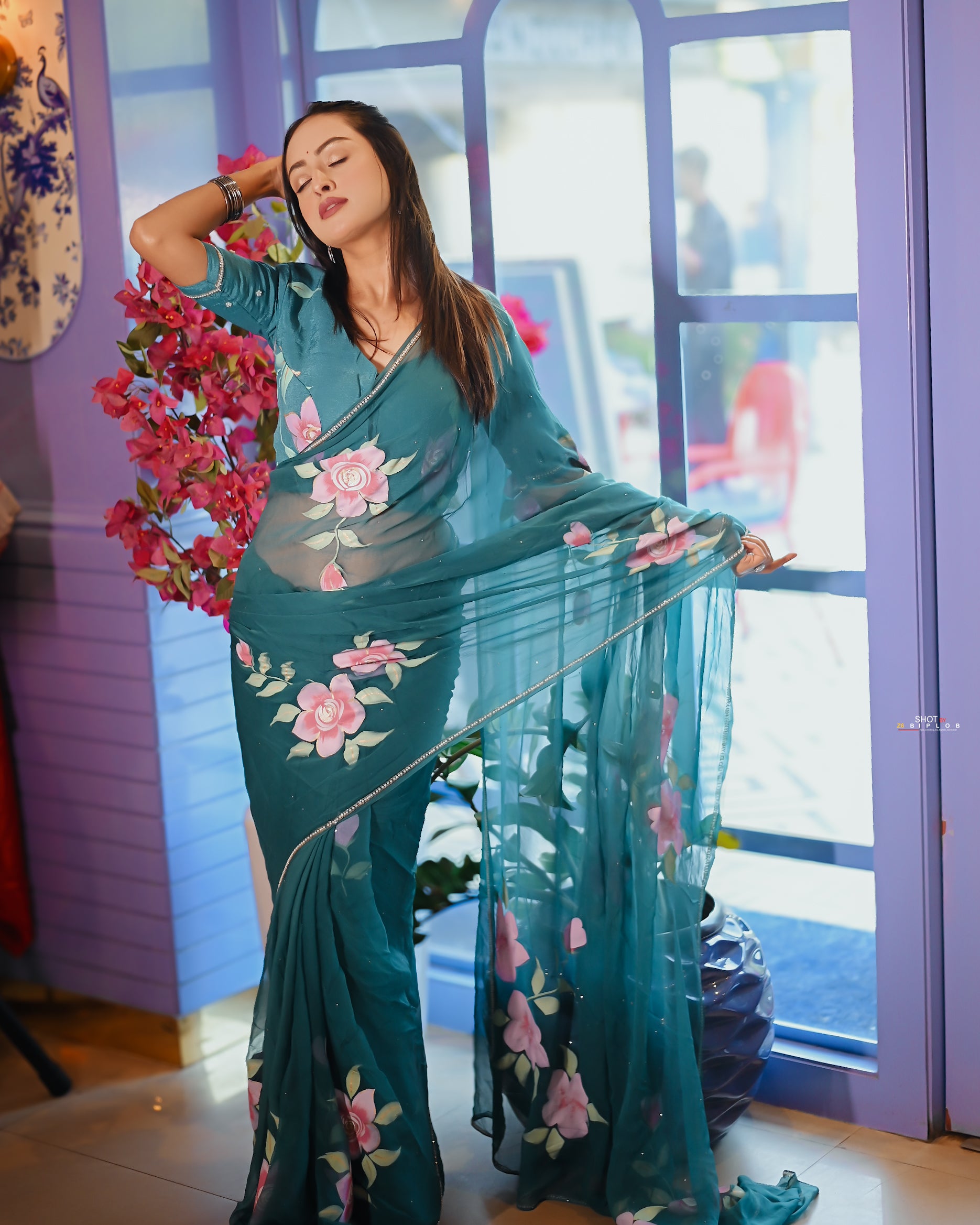 Teal Rose Serenade (Handpainted pure viscose chiffon saree with hand-embroidery)