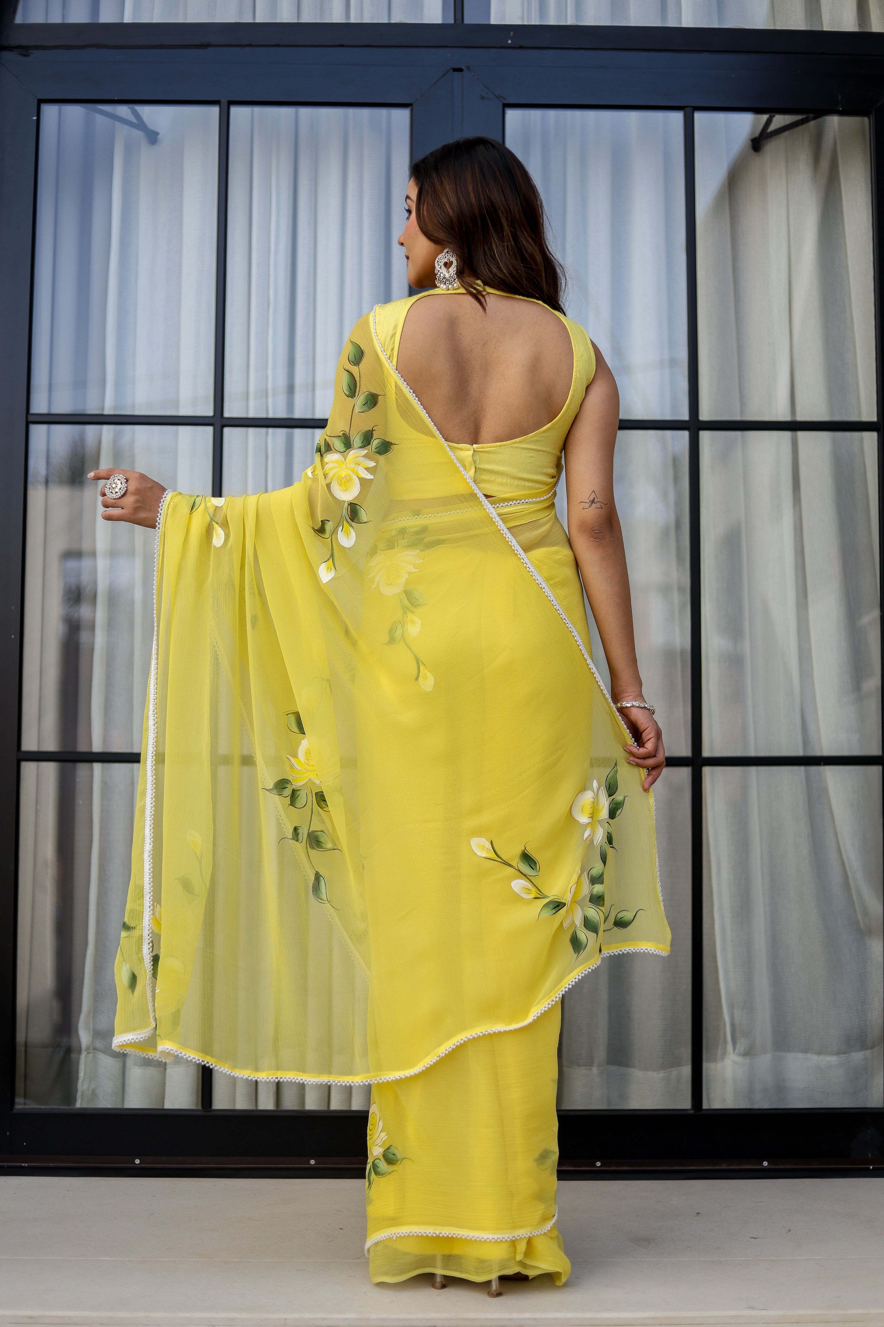 Sunlit Bloom (Handpainted pure viscose chiffon saree with pearl border)