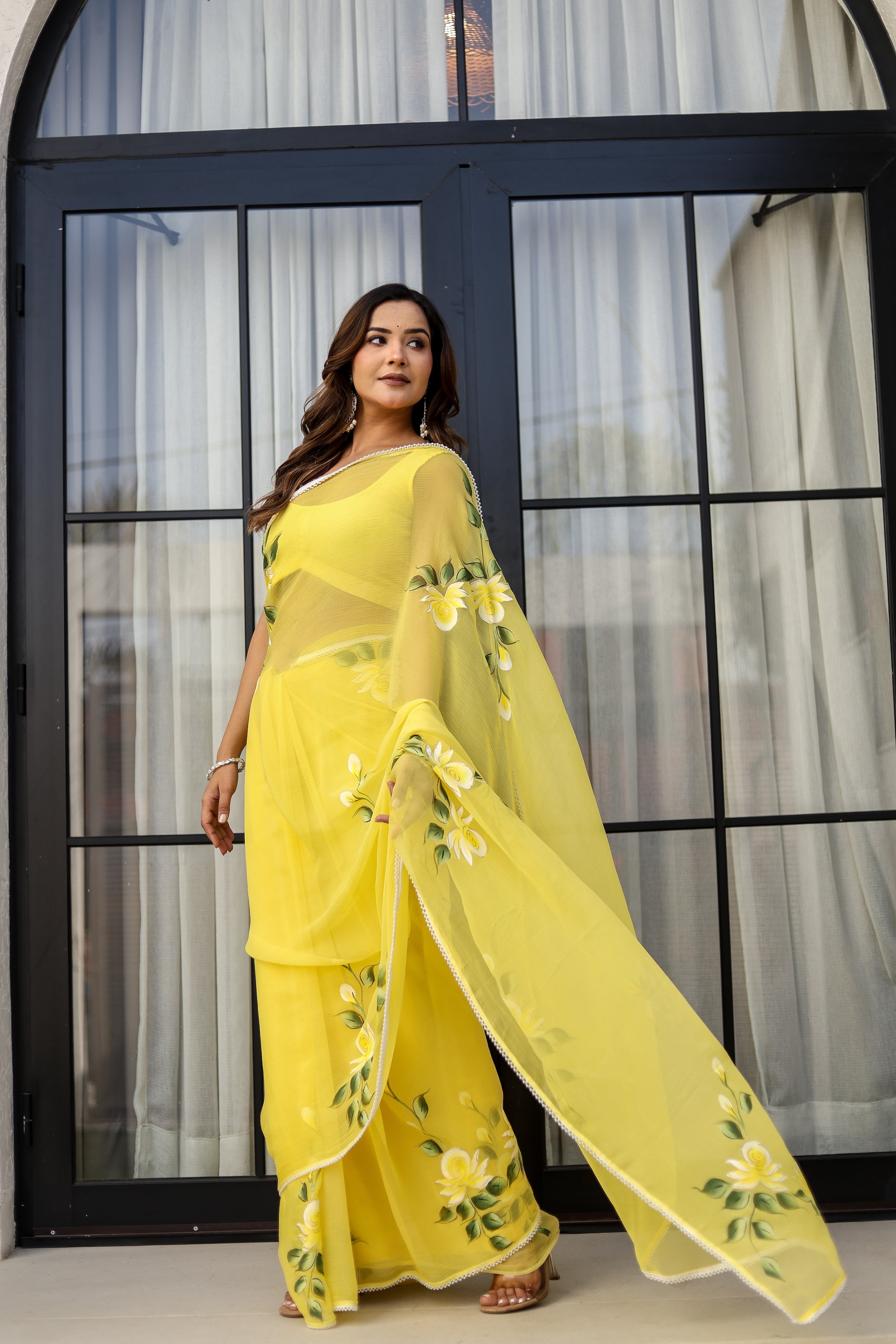 Sunlit Bloom (Handpainted pure viscose chiffon saree with pearl border)