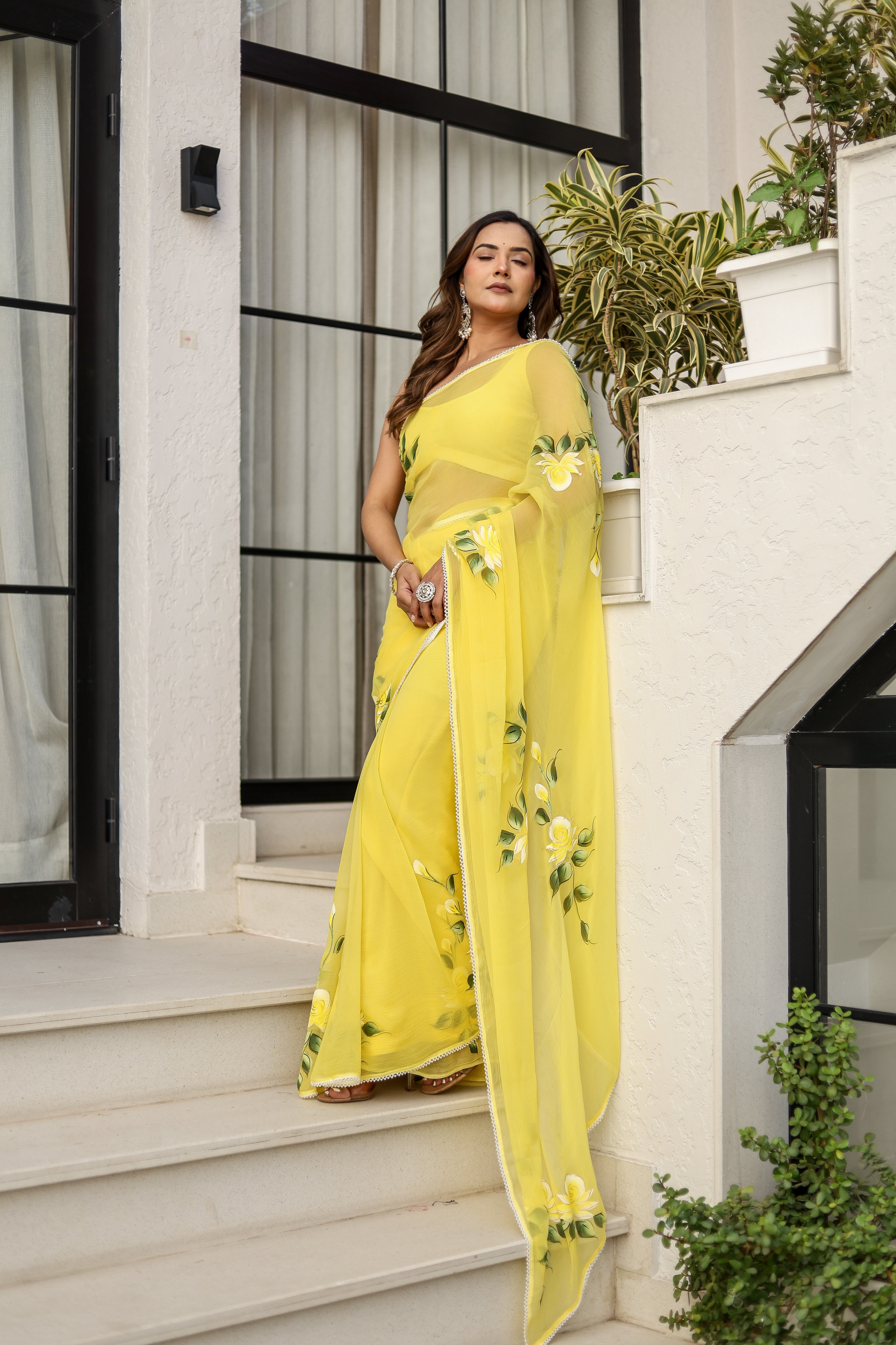 Sunlit Bloom (Handpainted pure viscose chiffon saree with pearl border)