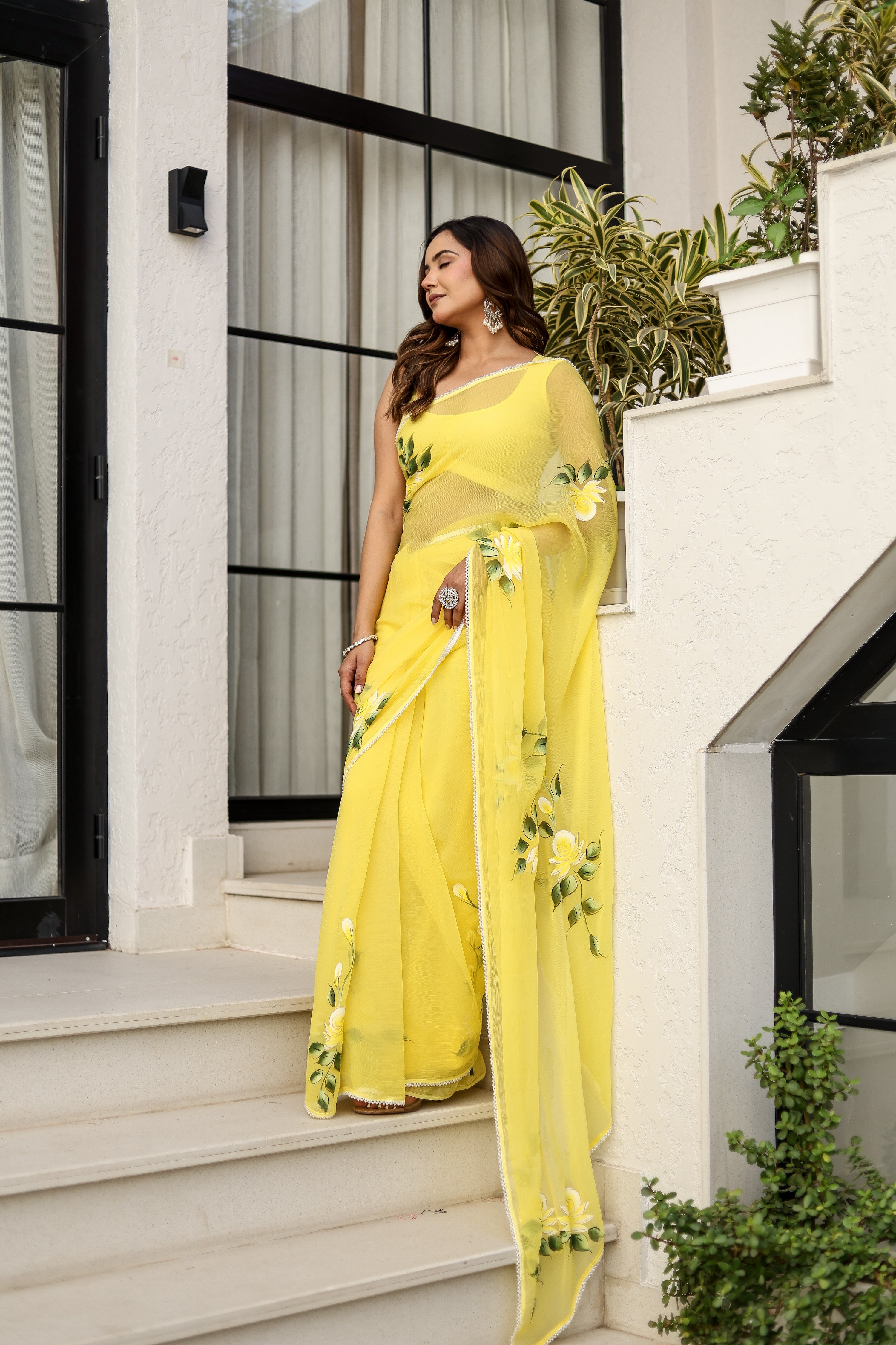 Sunlit Bloom (Handpainted pure viscose chiffon saree with pearl border)