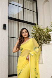 Sunlit Bloom (Handpainted pure viscose chiffon saree with pearl border)