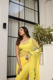 Sunlit Bloom (Handpainted pure viscose chiffon saree with pearl border)